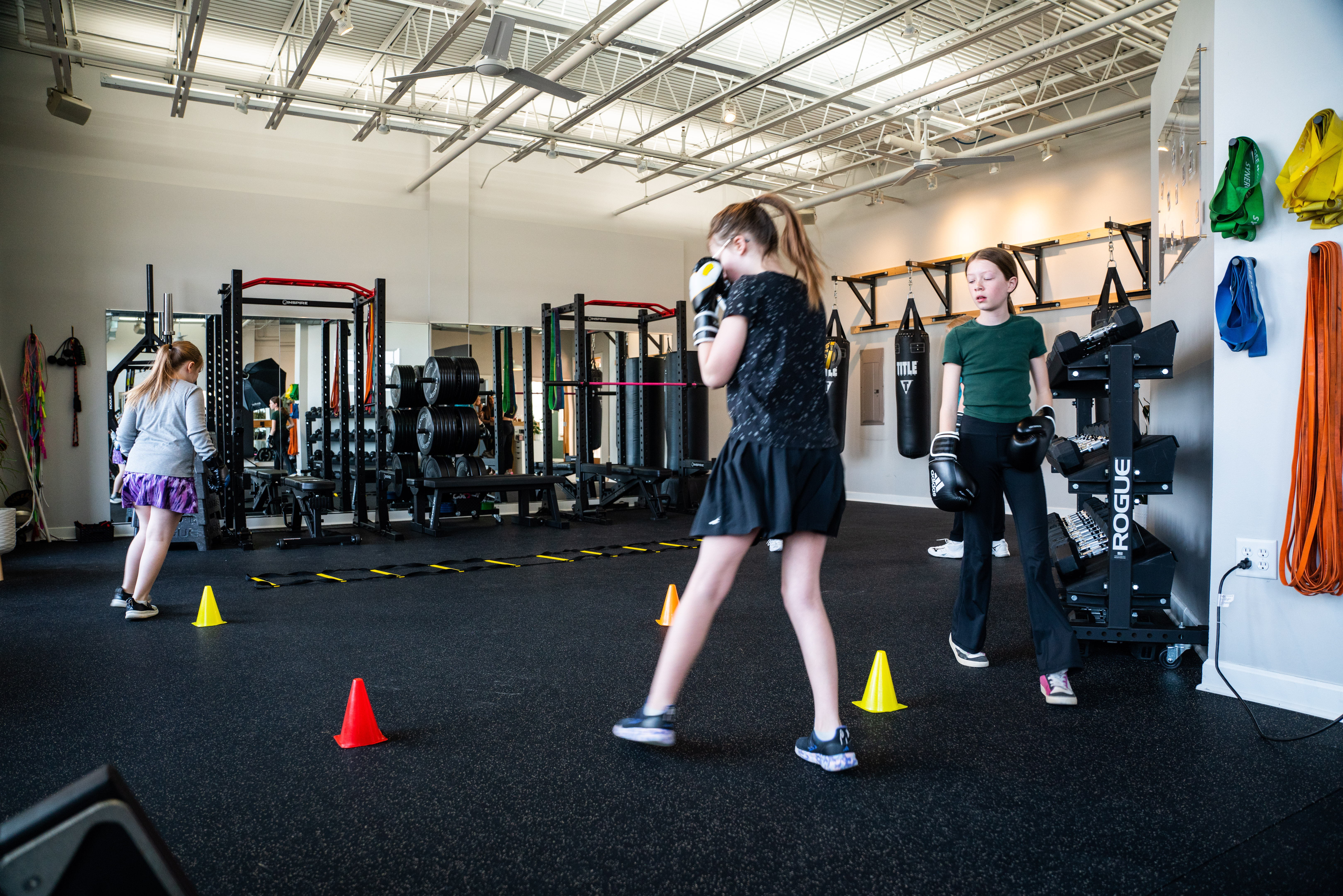 Gym Instructor with boxing gloves in Anchor Fitness Pewaukee