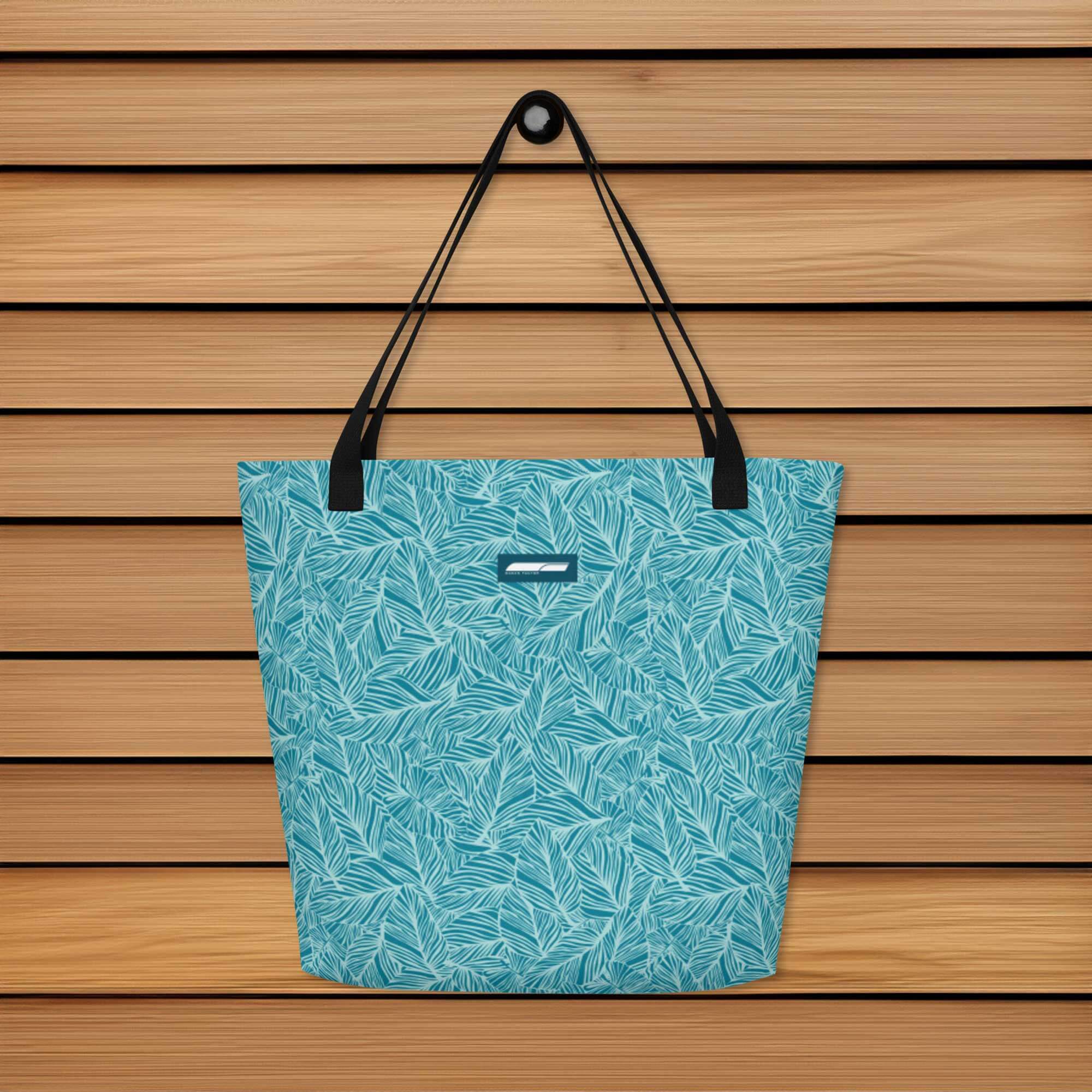 a tote bag hanging on a wooden panel wall'