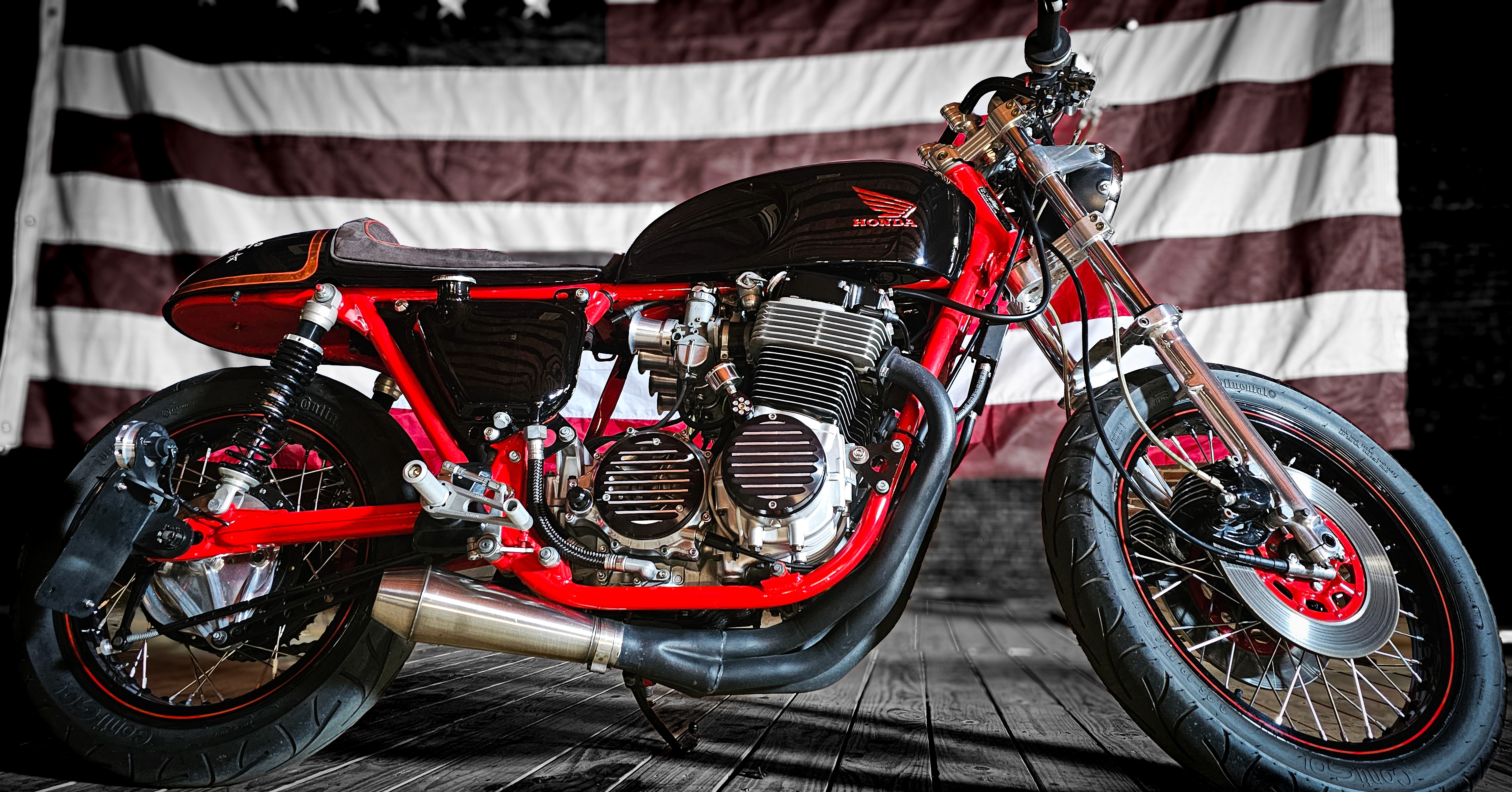 Custom green motorcycle in workshop