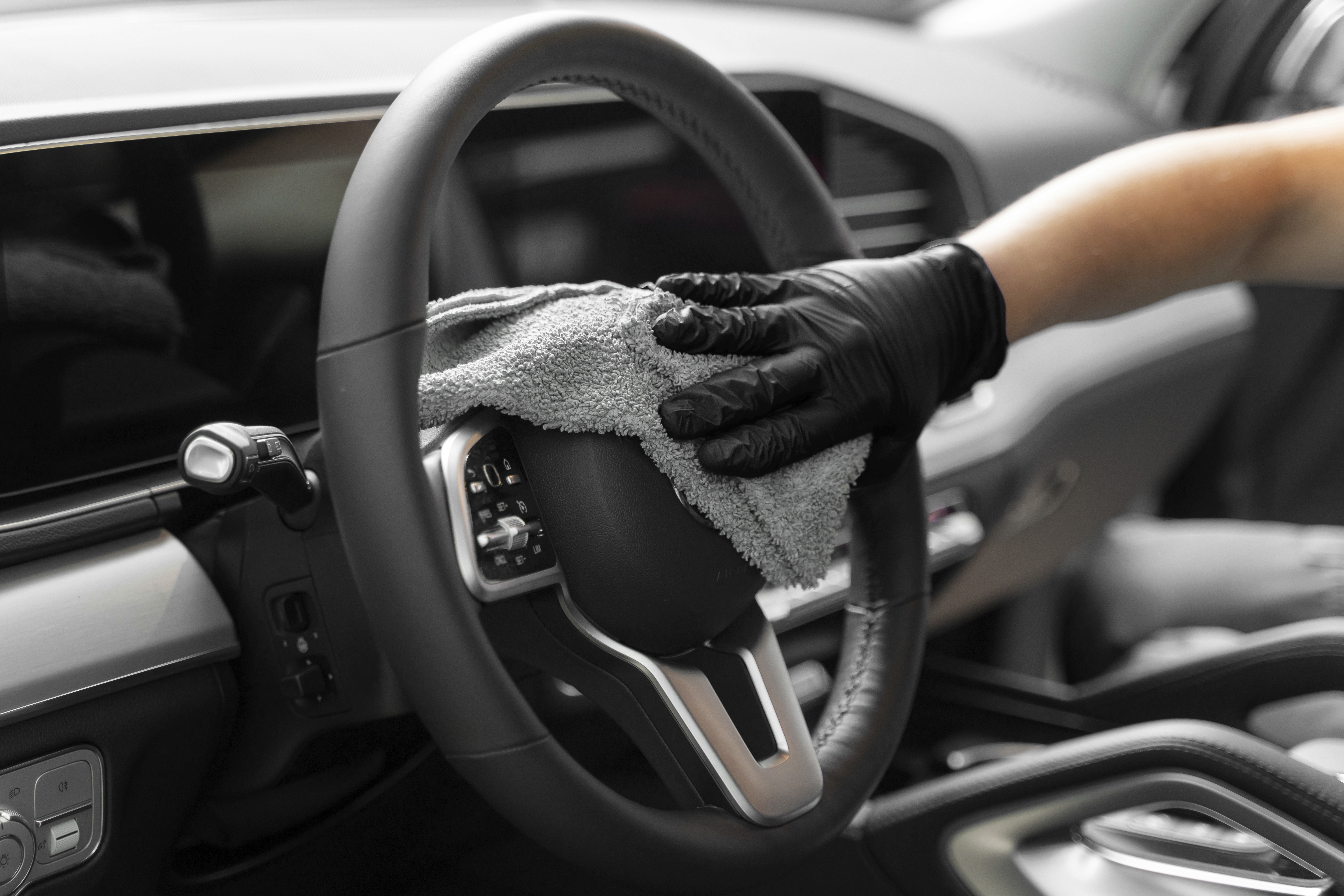 A serene spa setting with two lounge chairs beside a warm, reflective pool and soft, natural lighting.
