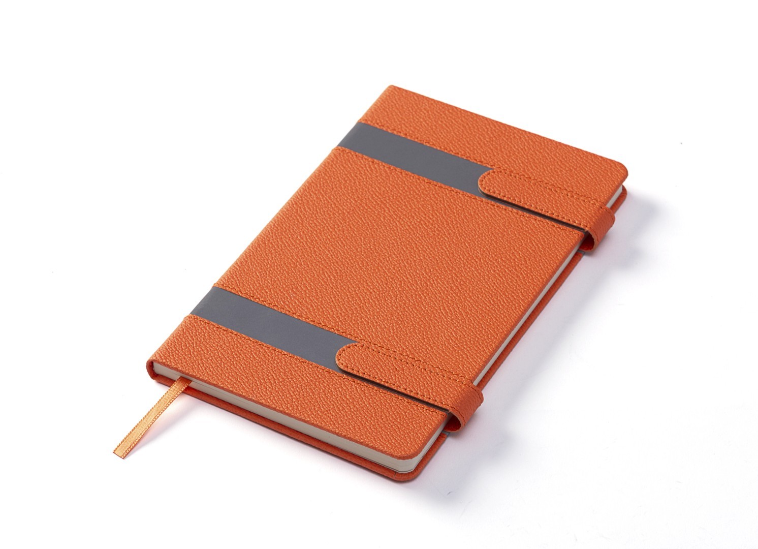 Angled view of closed orange notebook with dual straps.