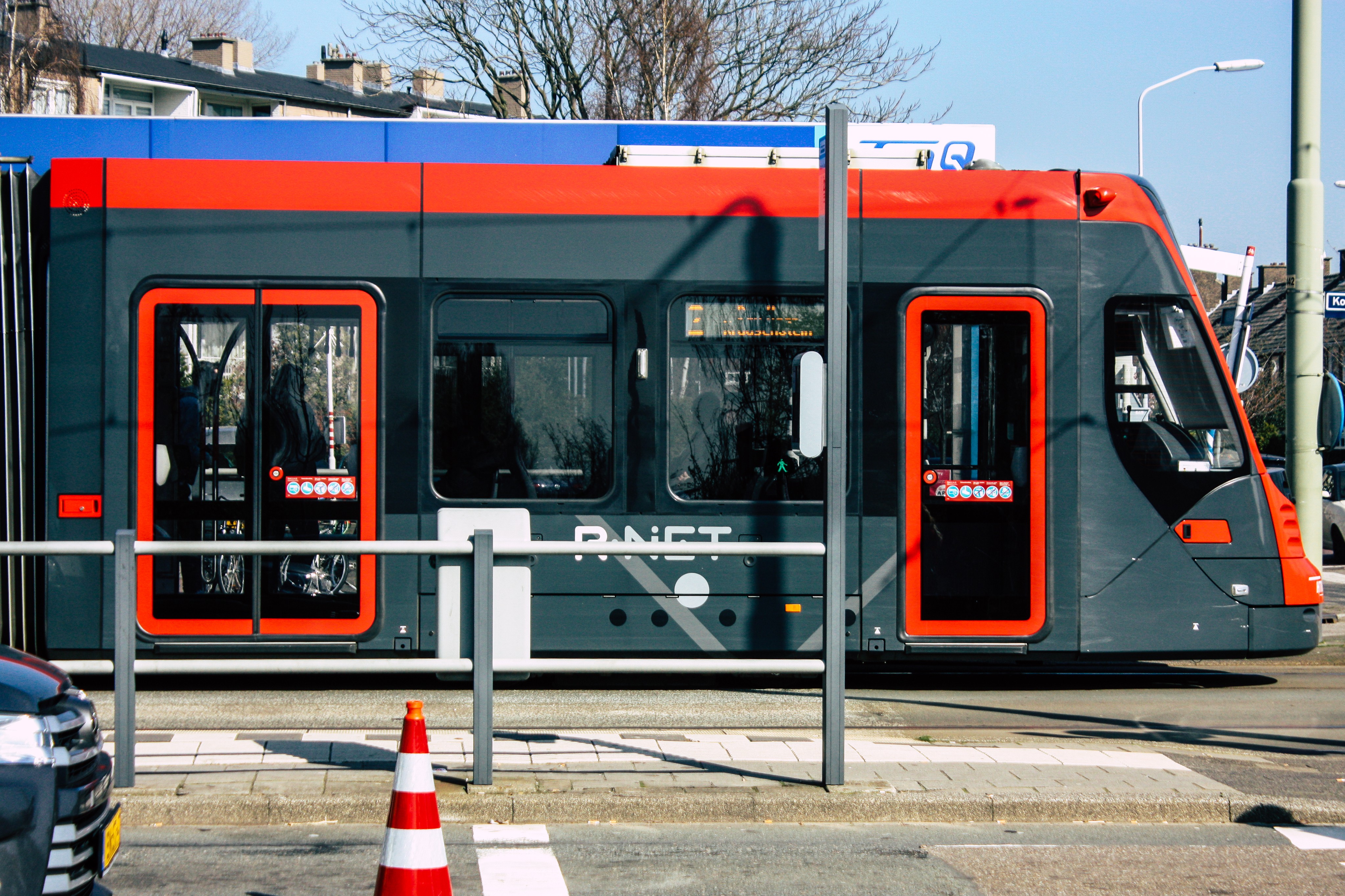 two people looking at a tablet and smiling