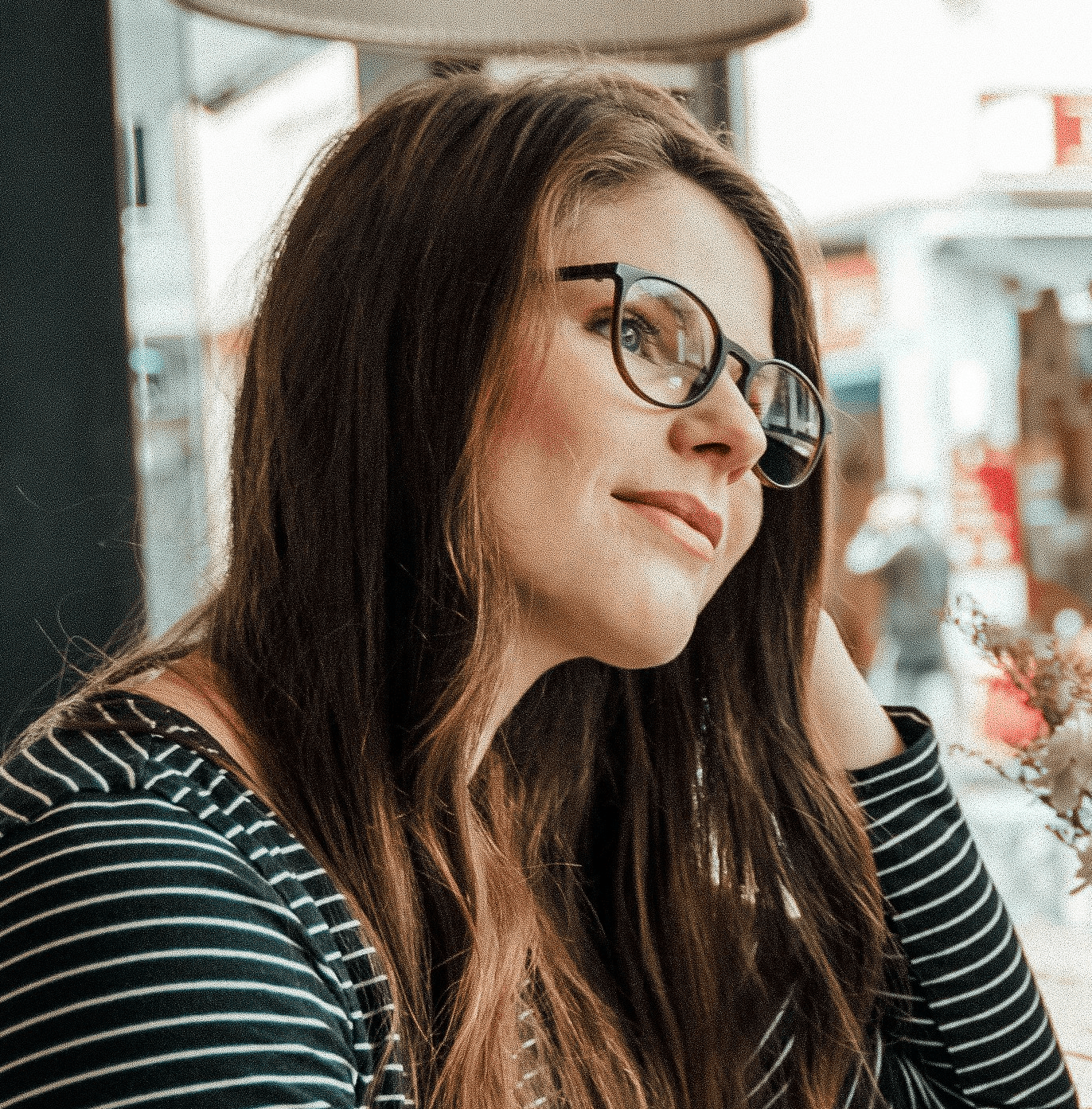 woman leaning at the table