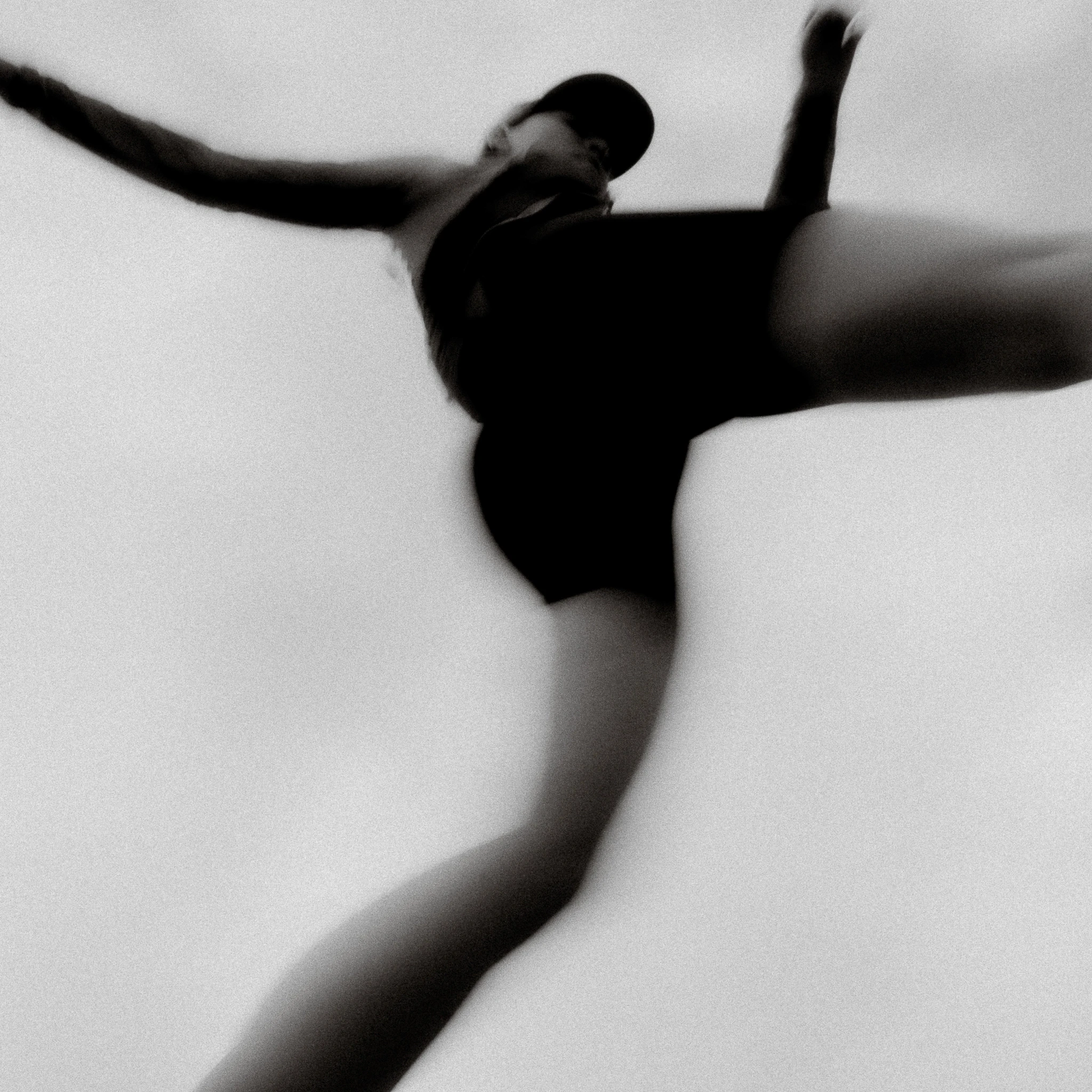 dynamic picture of a woman trail running, unconventional.