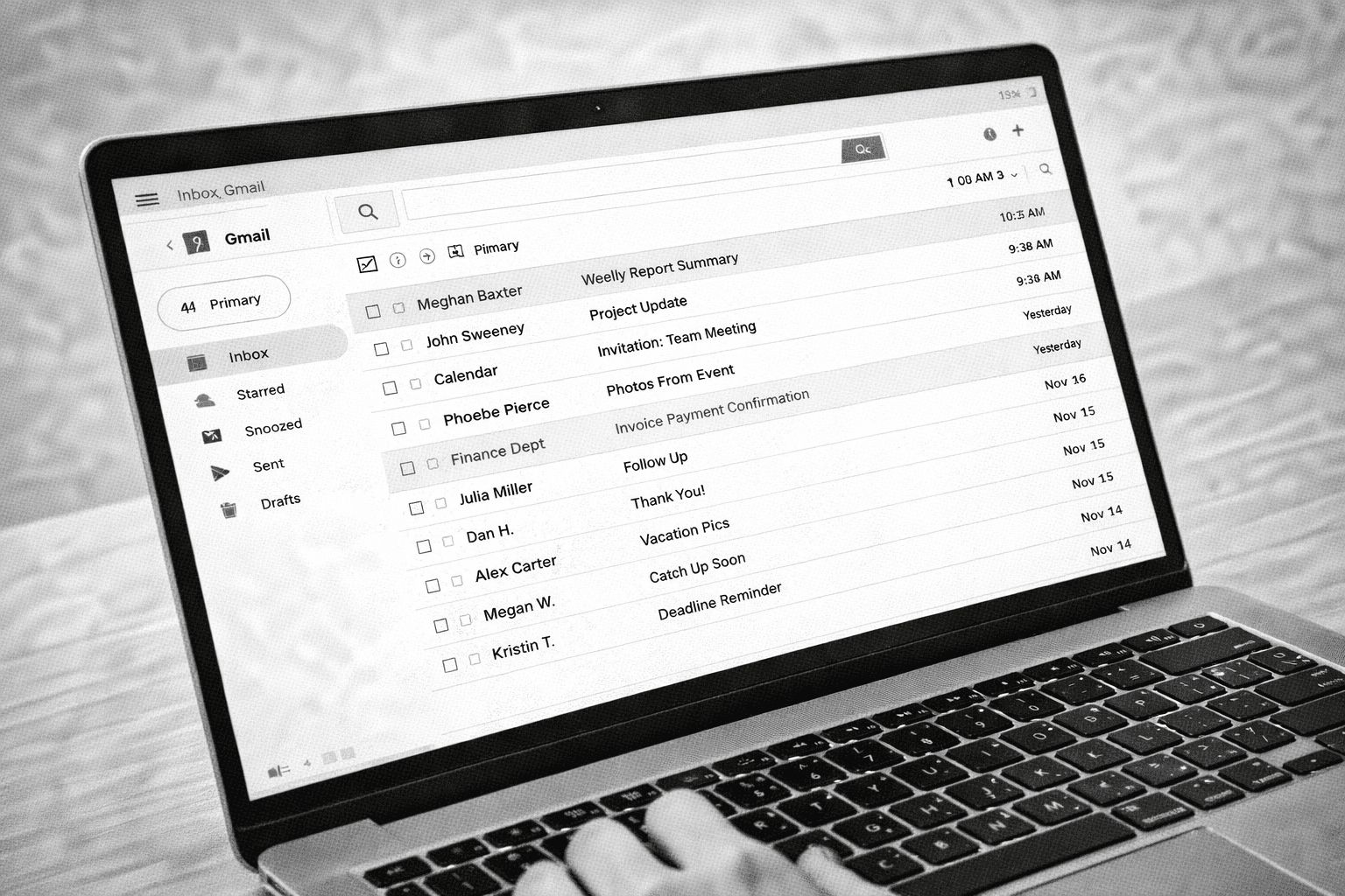 a laptop screen showing a list containing text. black and white image.