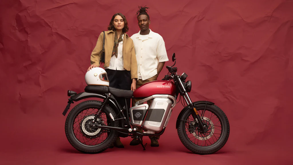 Maeving electric motorcycle with riders demonstrating British-built sustainable transportation 4. Jigcar