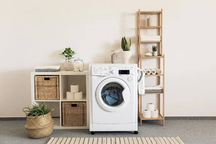 a-washer-and-dryer-in-a-room - planetcare (unsplash)./pho