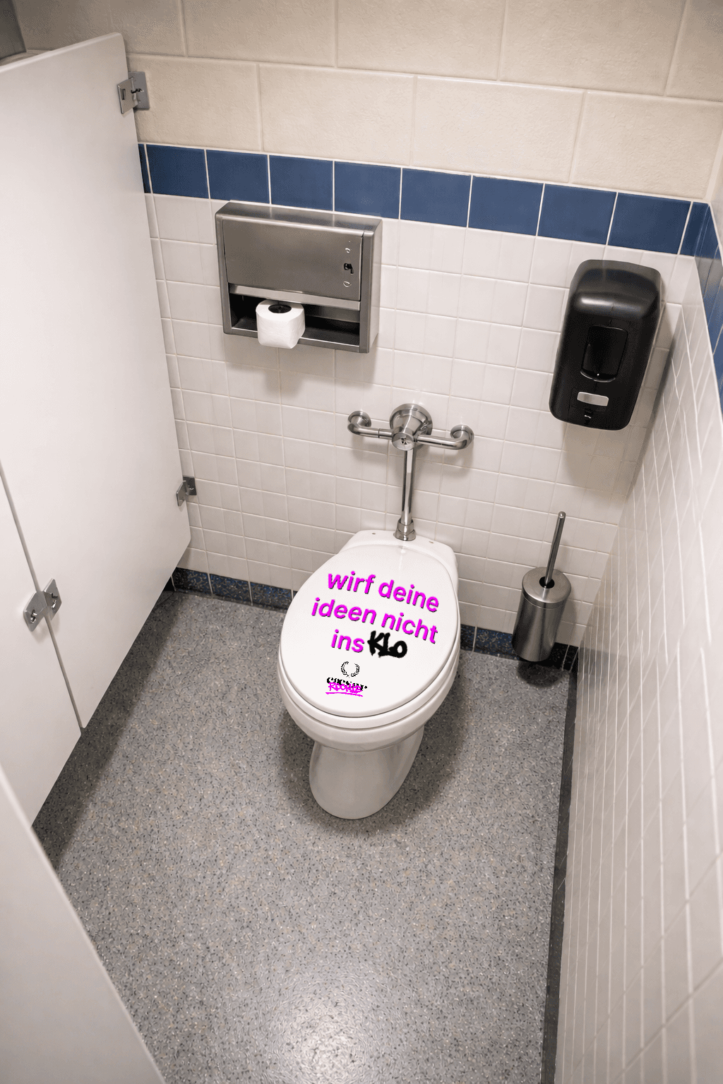 A bathroom stall featuring a toilet, hand sanitizer, and a mirror on the wall, with a small whimsical detail.