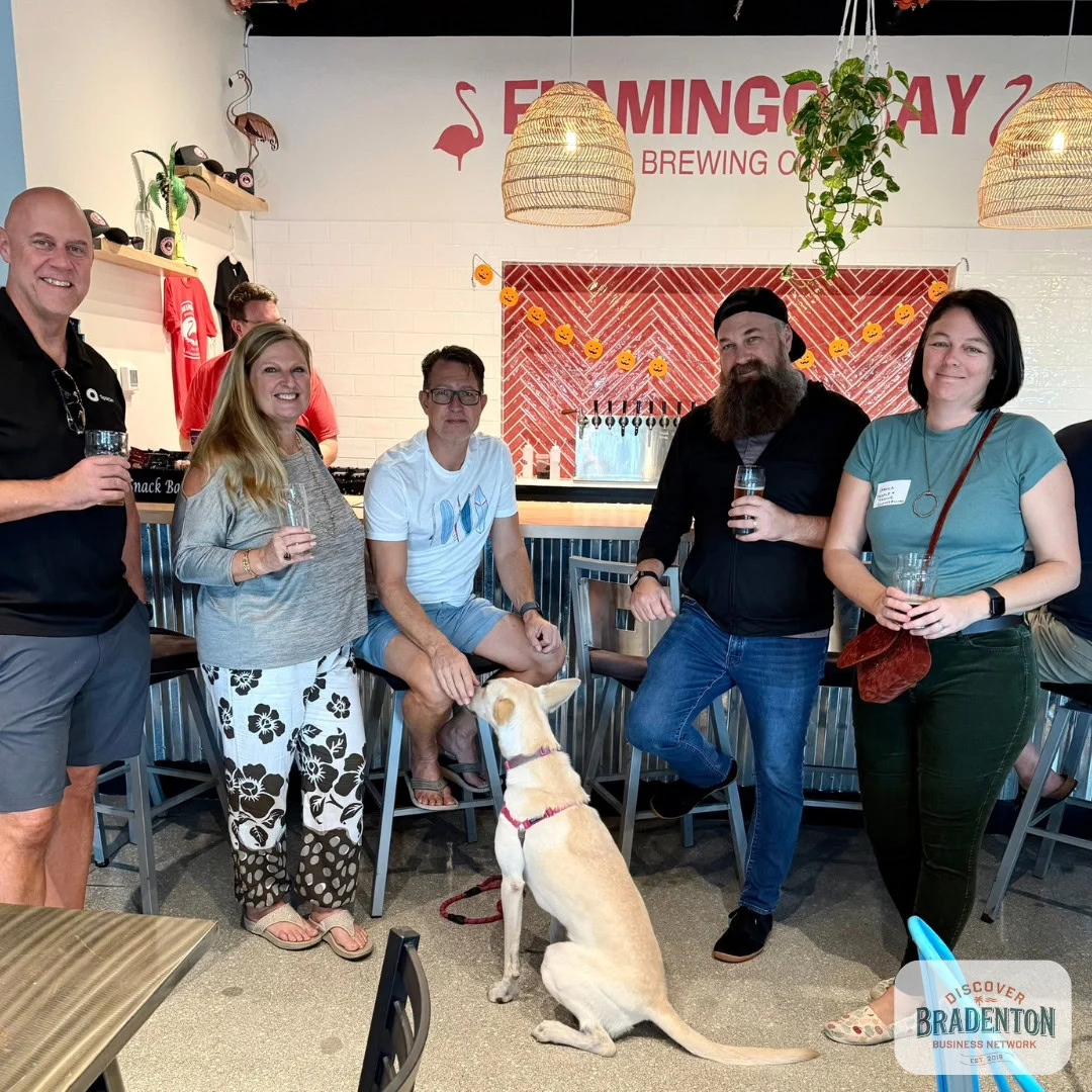 5 seated personsand a dog bradenton