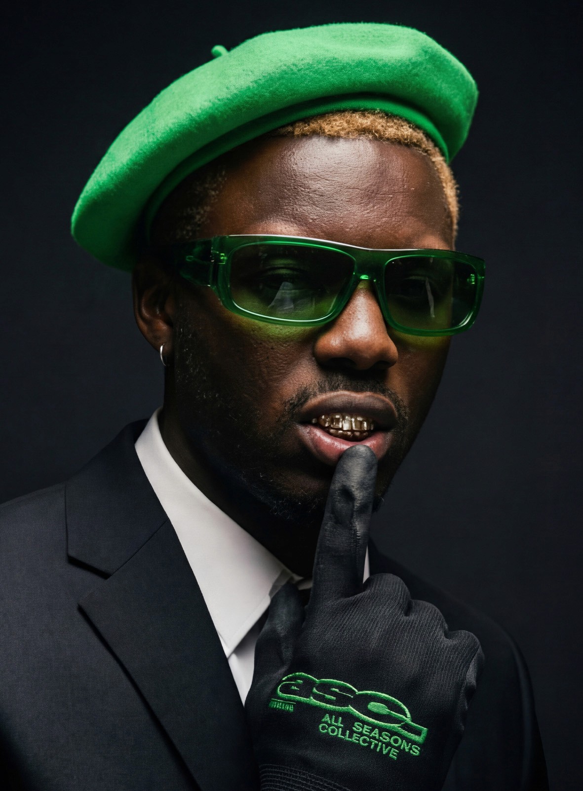 Glowing circular light orb in turquoise night sky