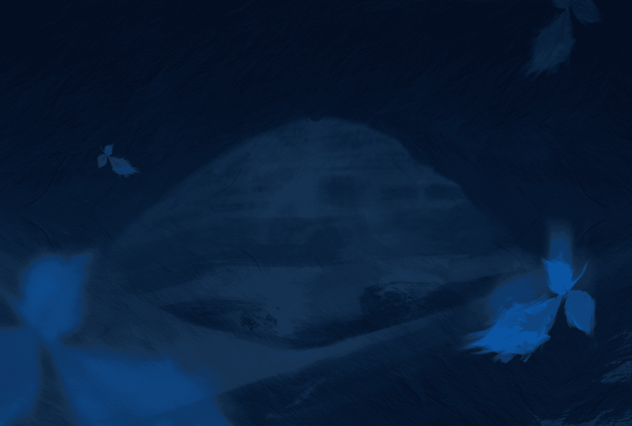 woman in blue tank top standing beside white wall