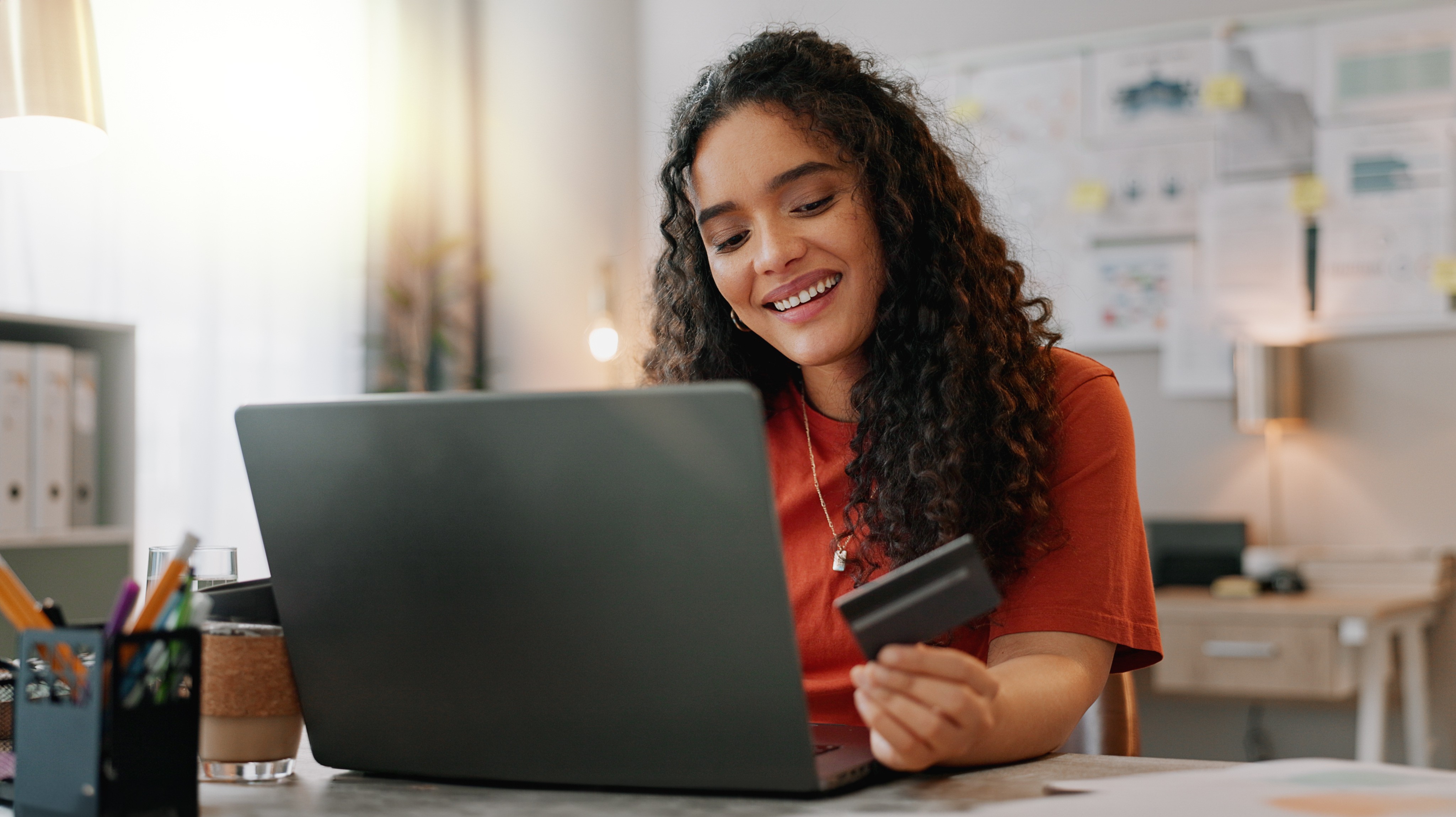 “Customer using a fingerprint-activated card to complete an age-restricted purchase.