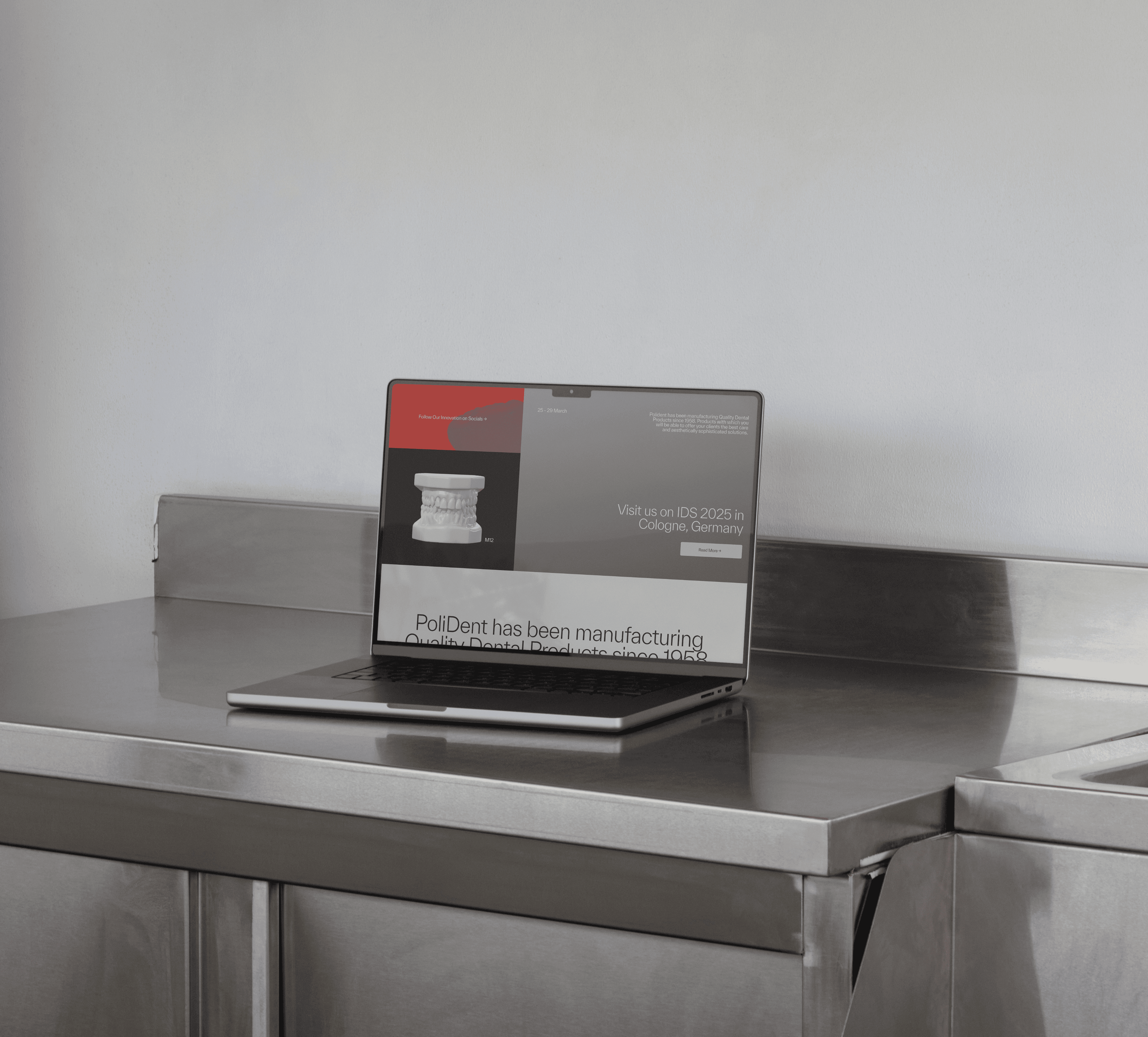 PoliDent website on a laptop