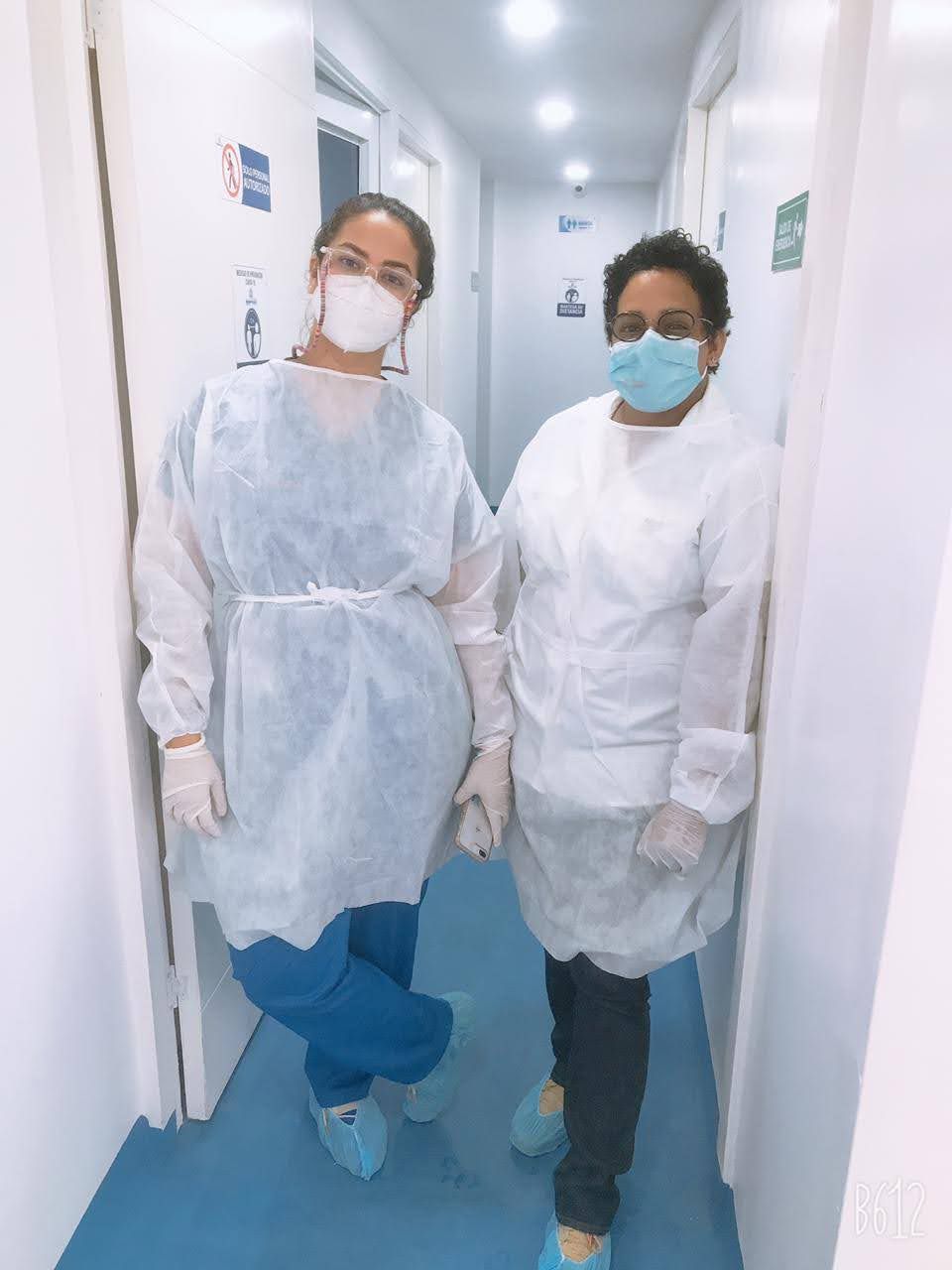 Lab technician kept a small chemical bottle in a stand