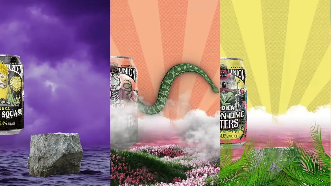 A grey rock in a purple sea, a green snake and a yellow sunrise, three worlds side by side