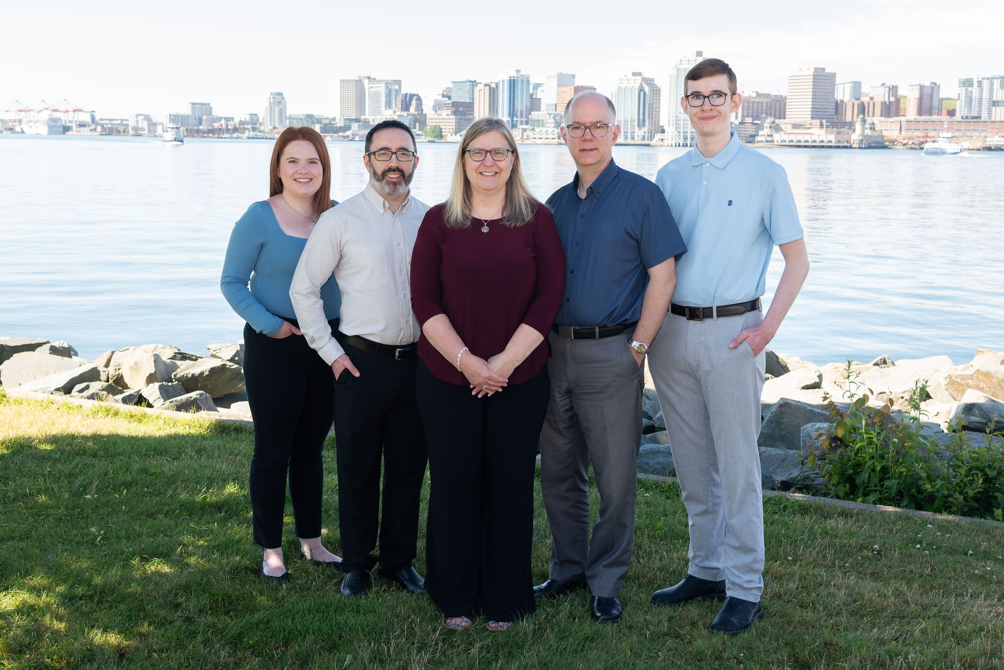 black flat screen tv on white wooden tv rack