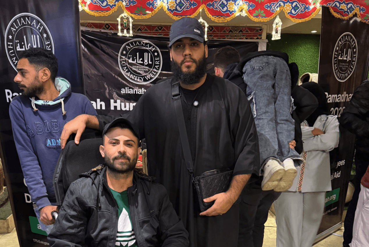 woman in blue hijab sitting on chair