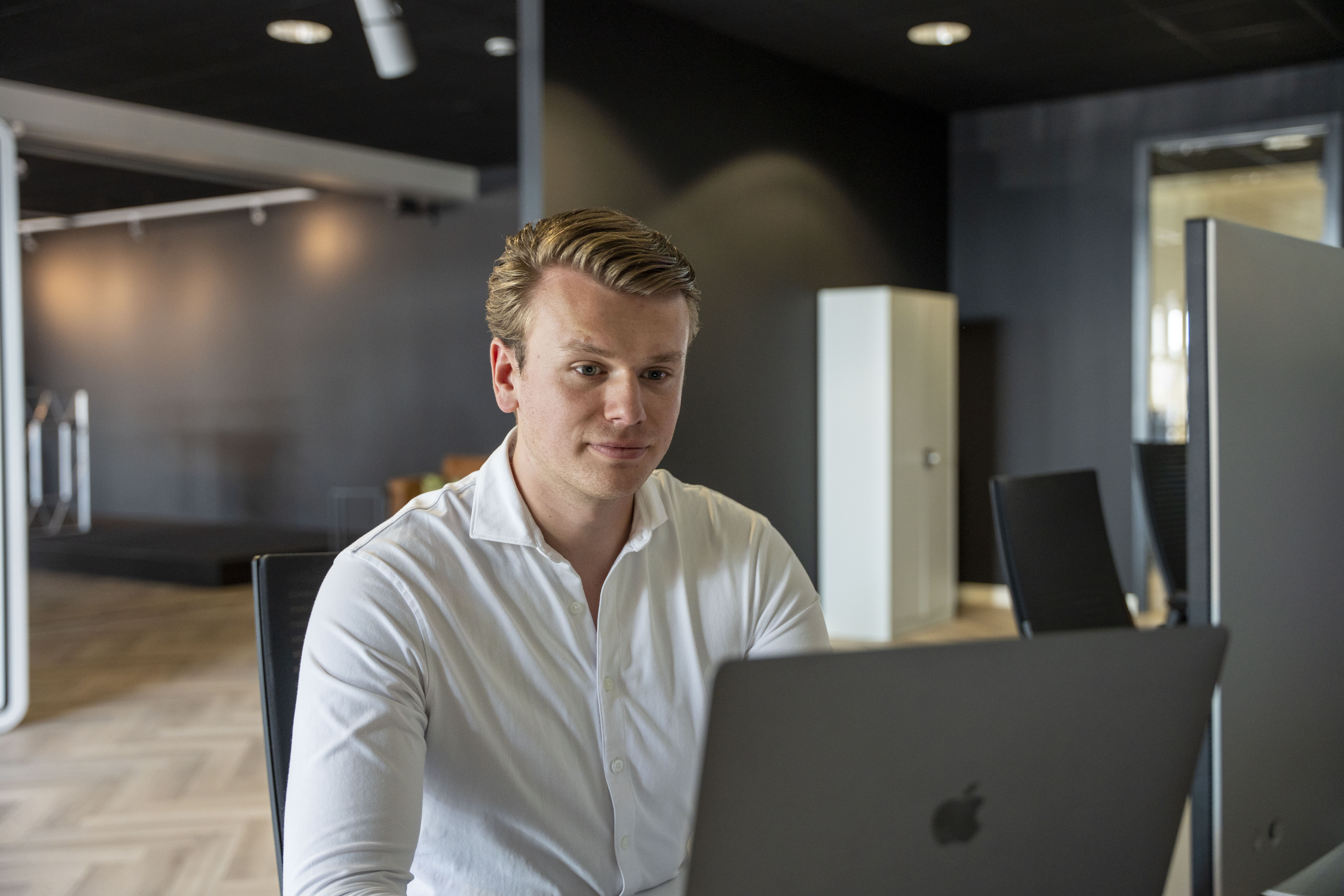 Mountains emerge from a sea of clouds.