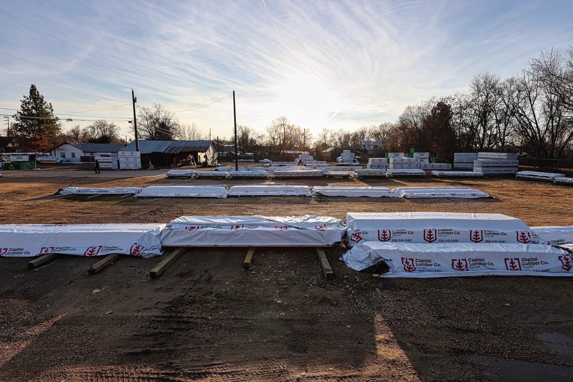 Wrapped lumber and sheet goods staged in the Capital Lumber yard