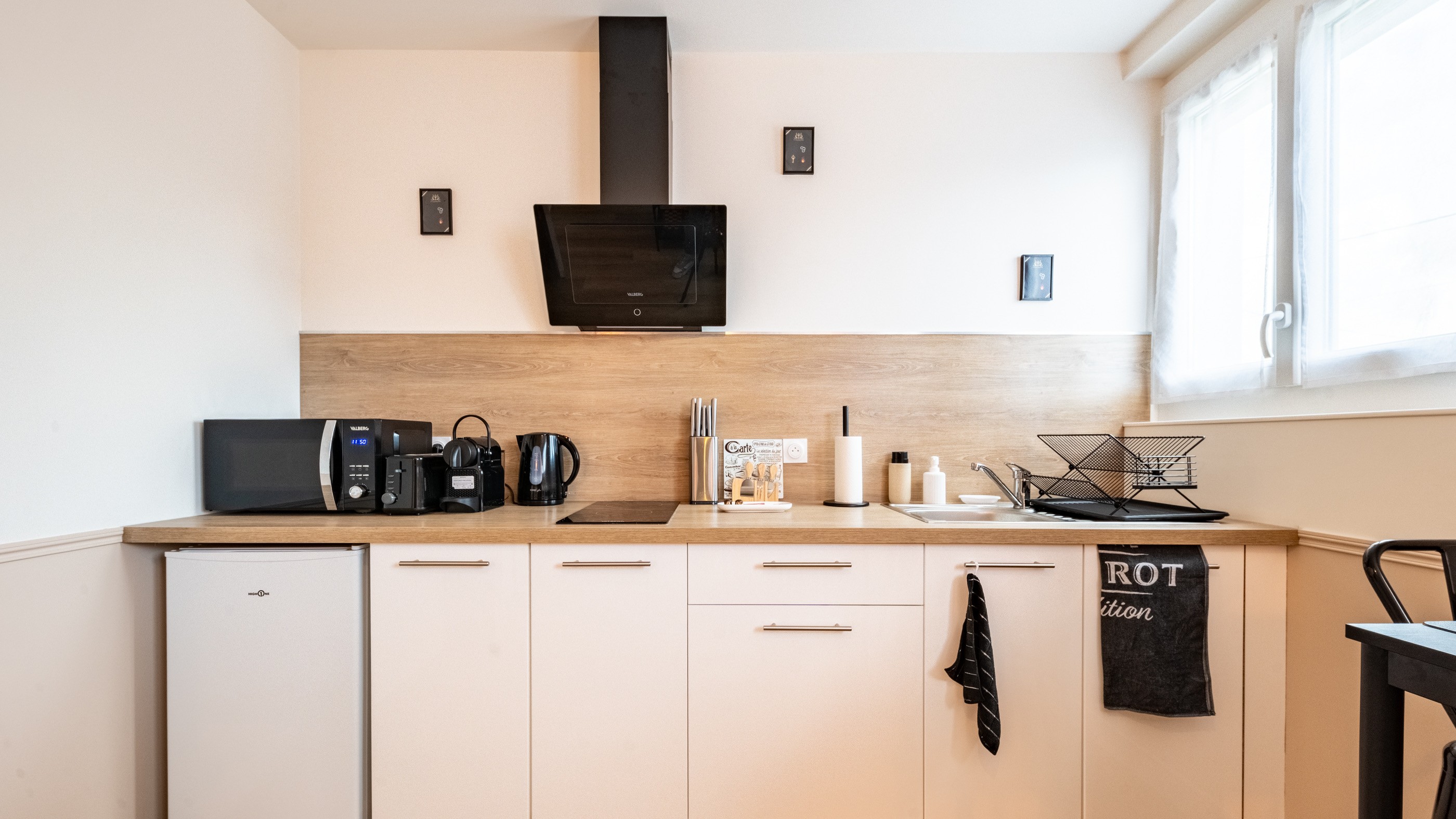 Man silhouetted against a bright orange light