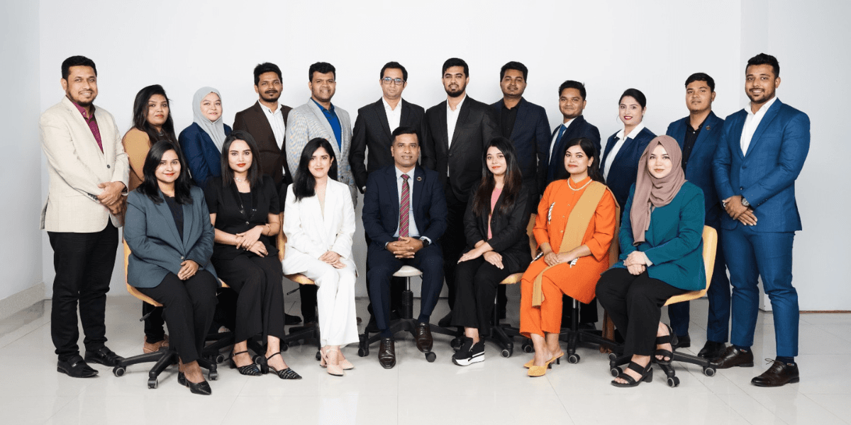 Bio-Xin Cosmeceuticals team celebrating their success in a professional group photo.