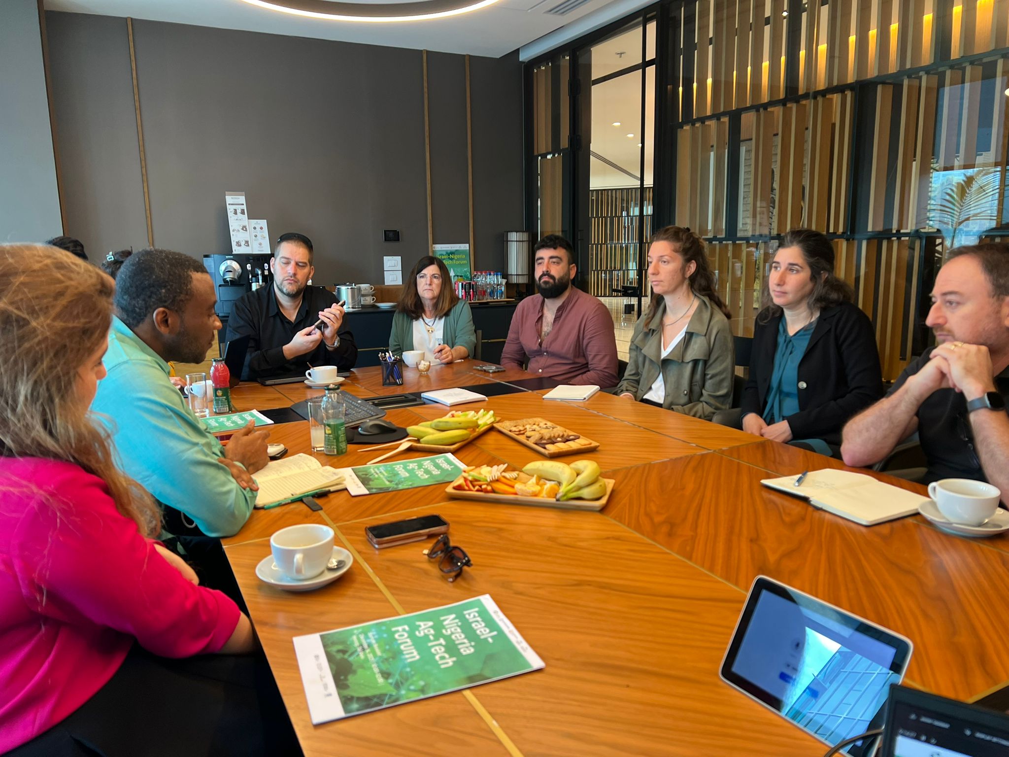 Close-up of a tree stump showing growth rings and a textured brown wood surface.