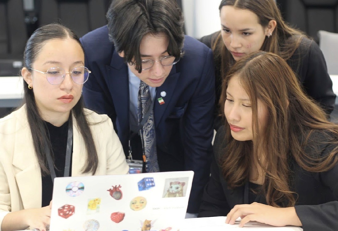 Close-up of joshua tree branches against a clear sky.