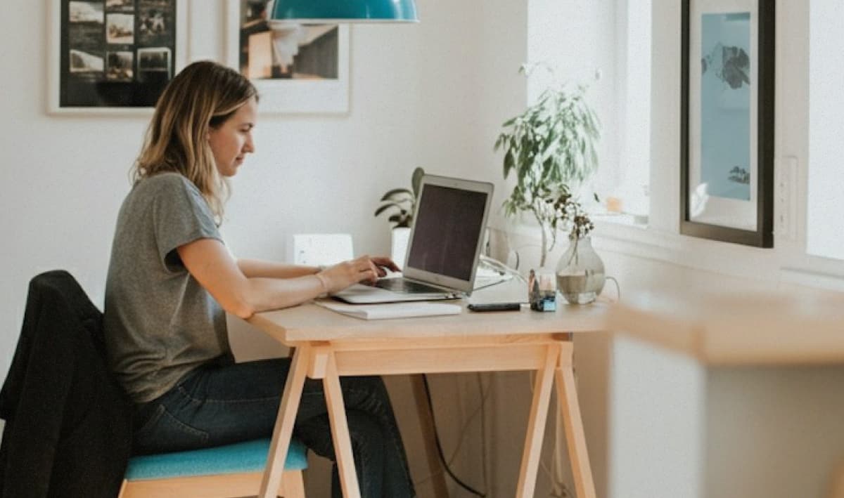 Woman working at her computer in a home office