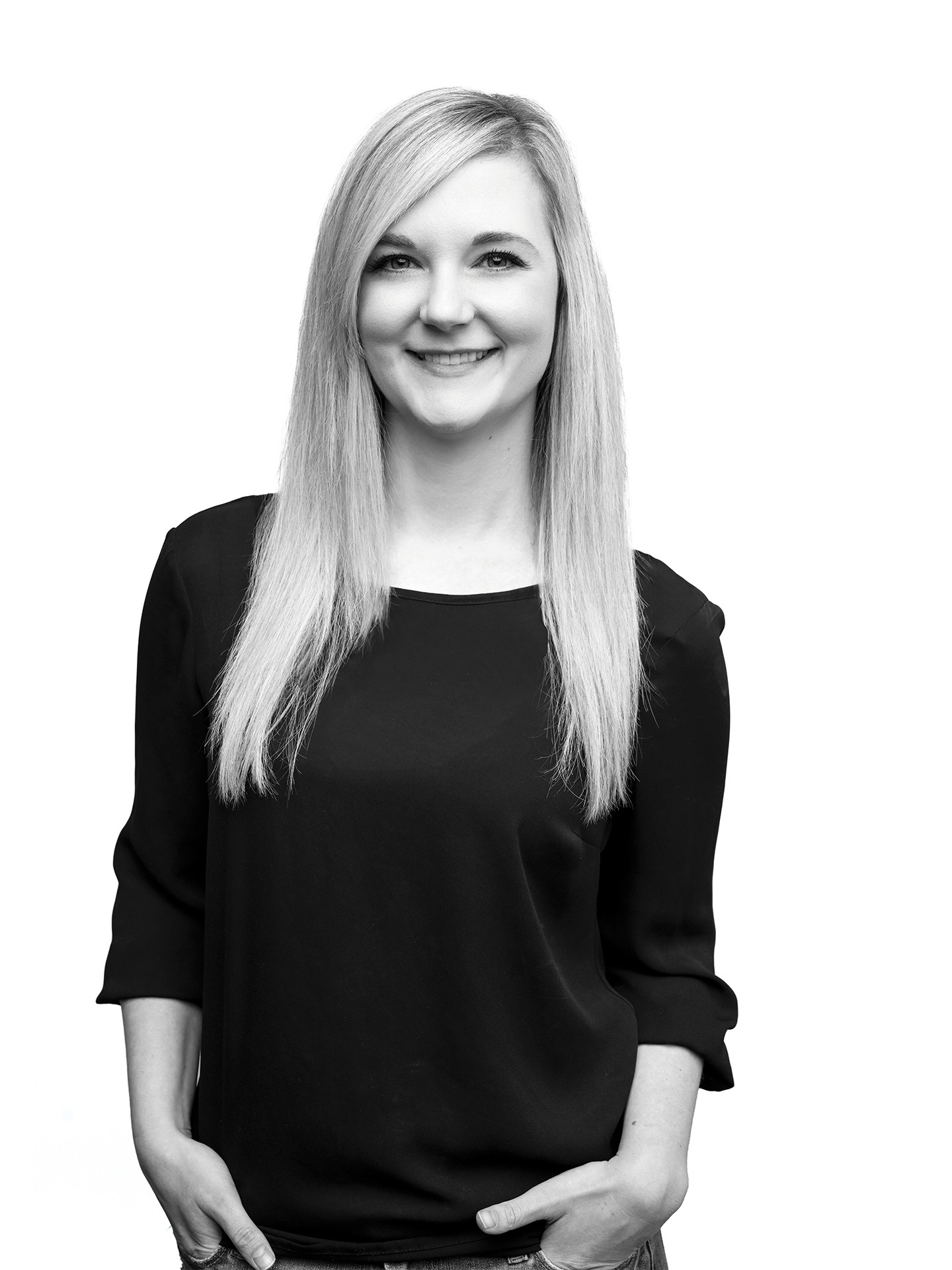 headshot of female in bright background