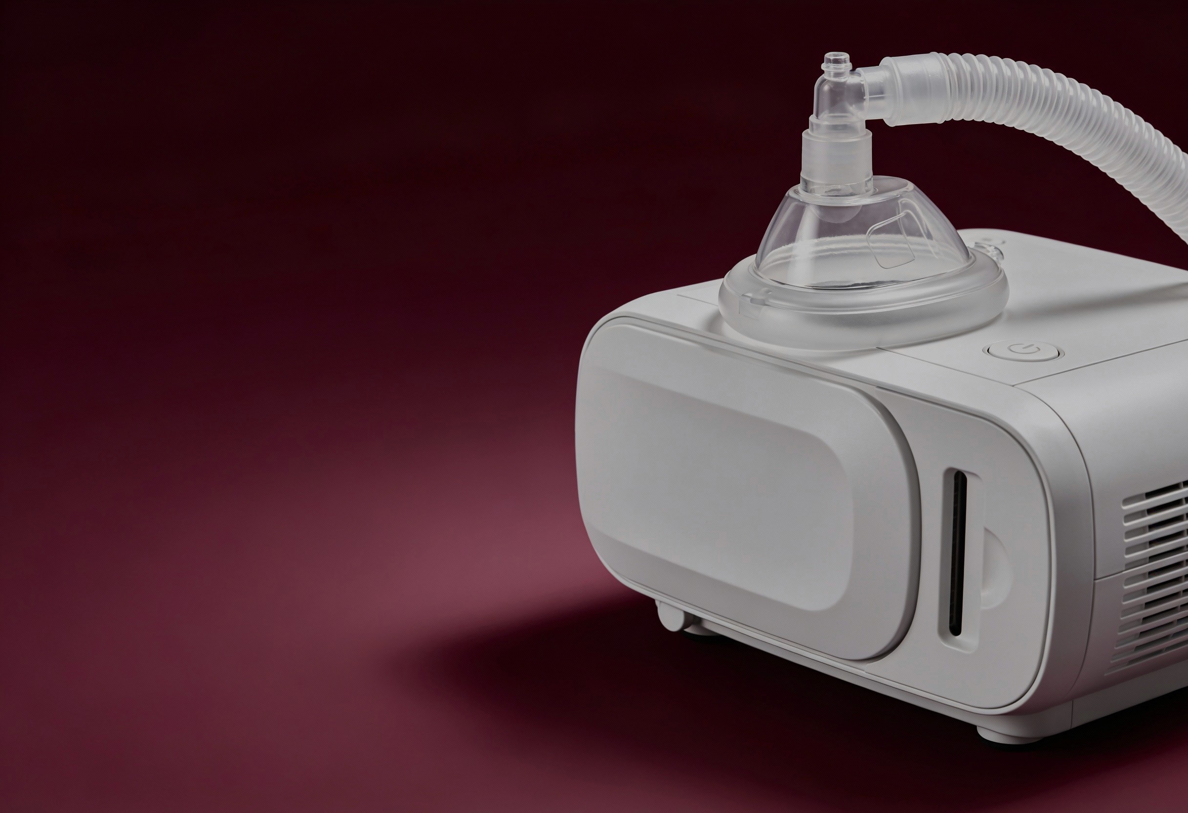 Modern CPAP machine with mask and tubing for sleep apnea therapy