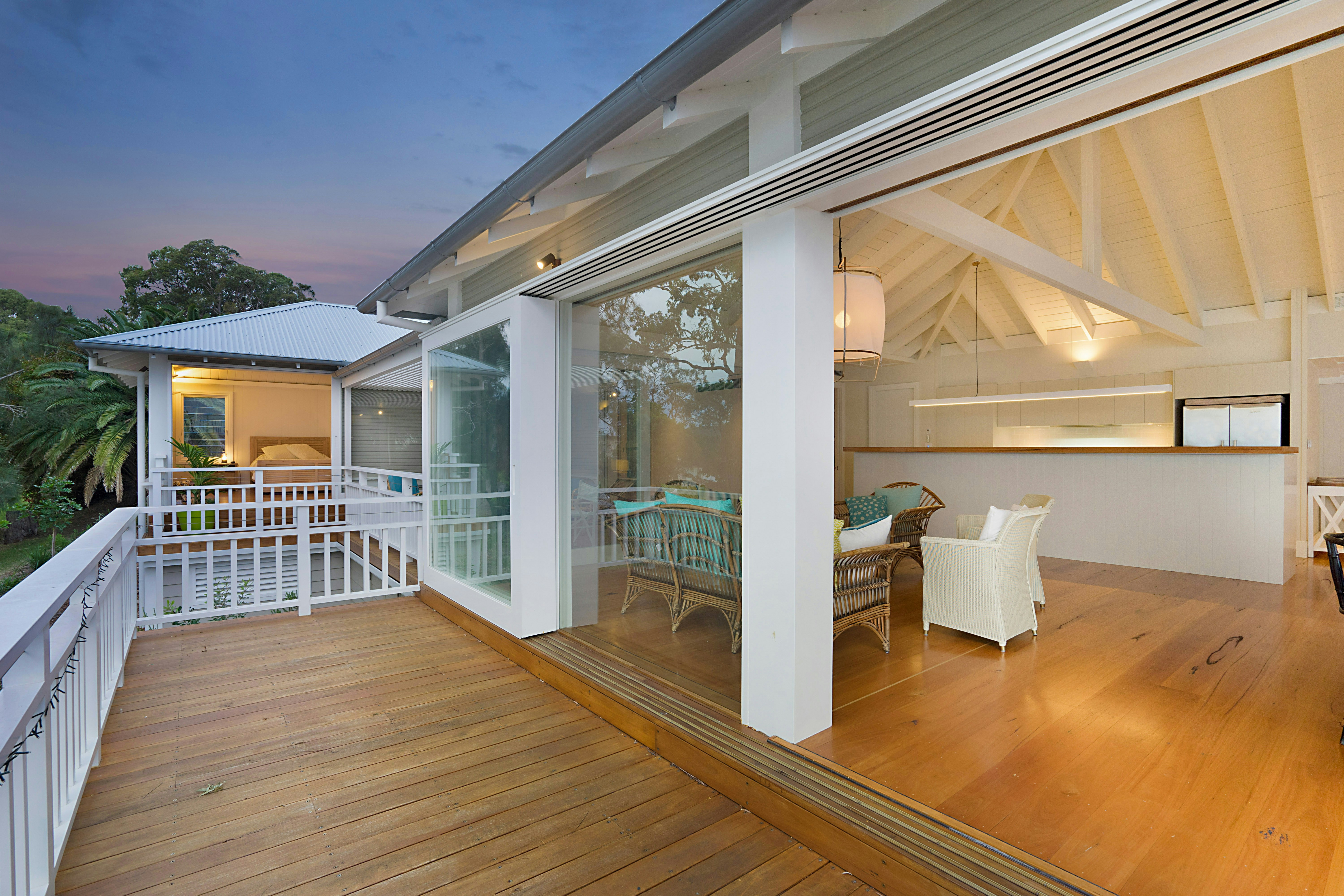 view photography of white wooden house