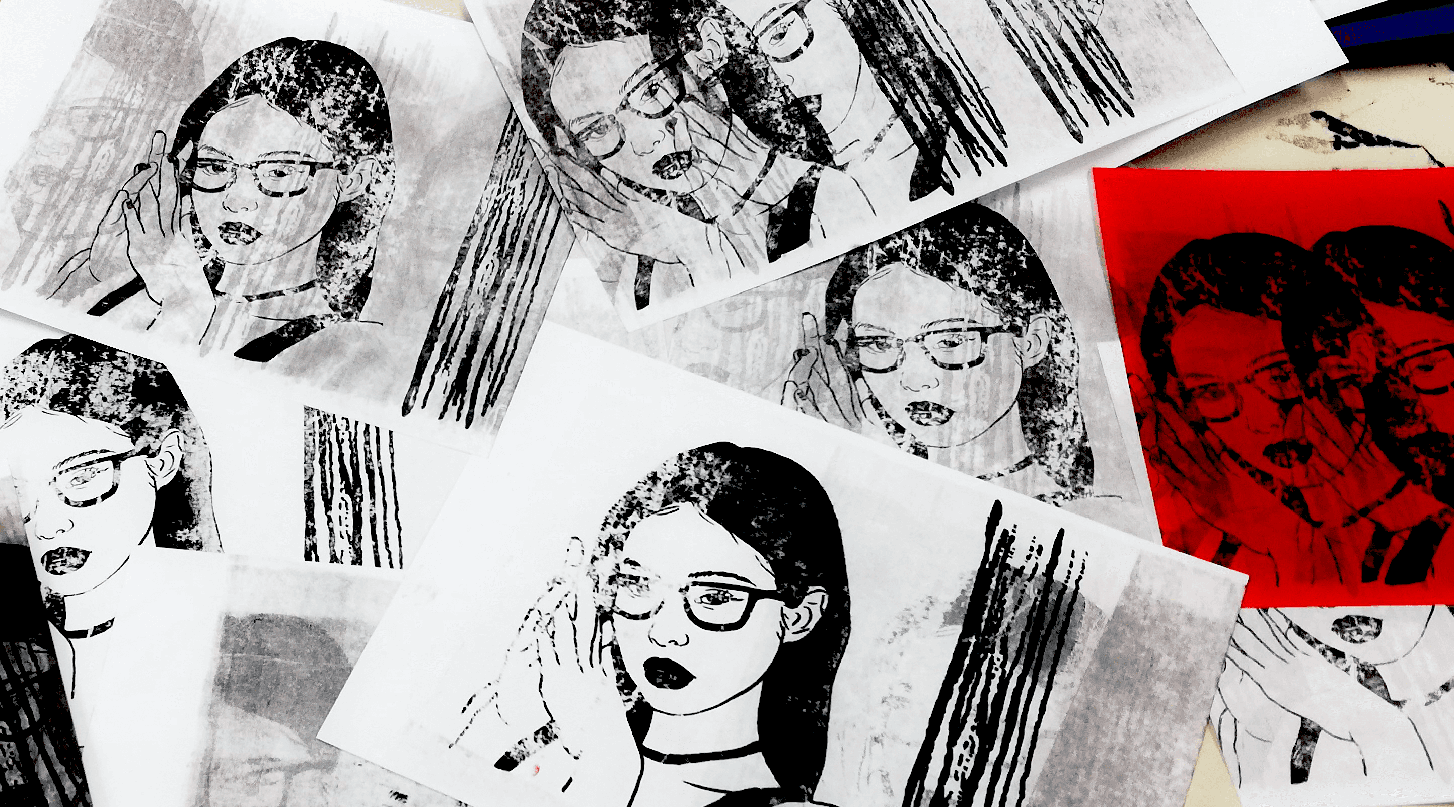 A close-up of a person wearing green-tinted glasses, with a serious expression and smooth skin.