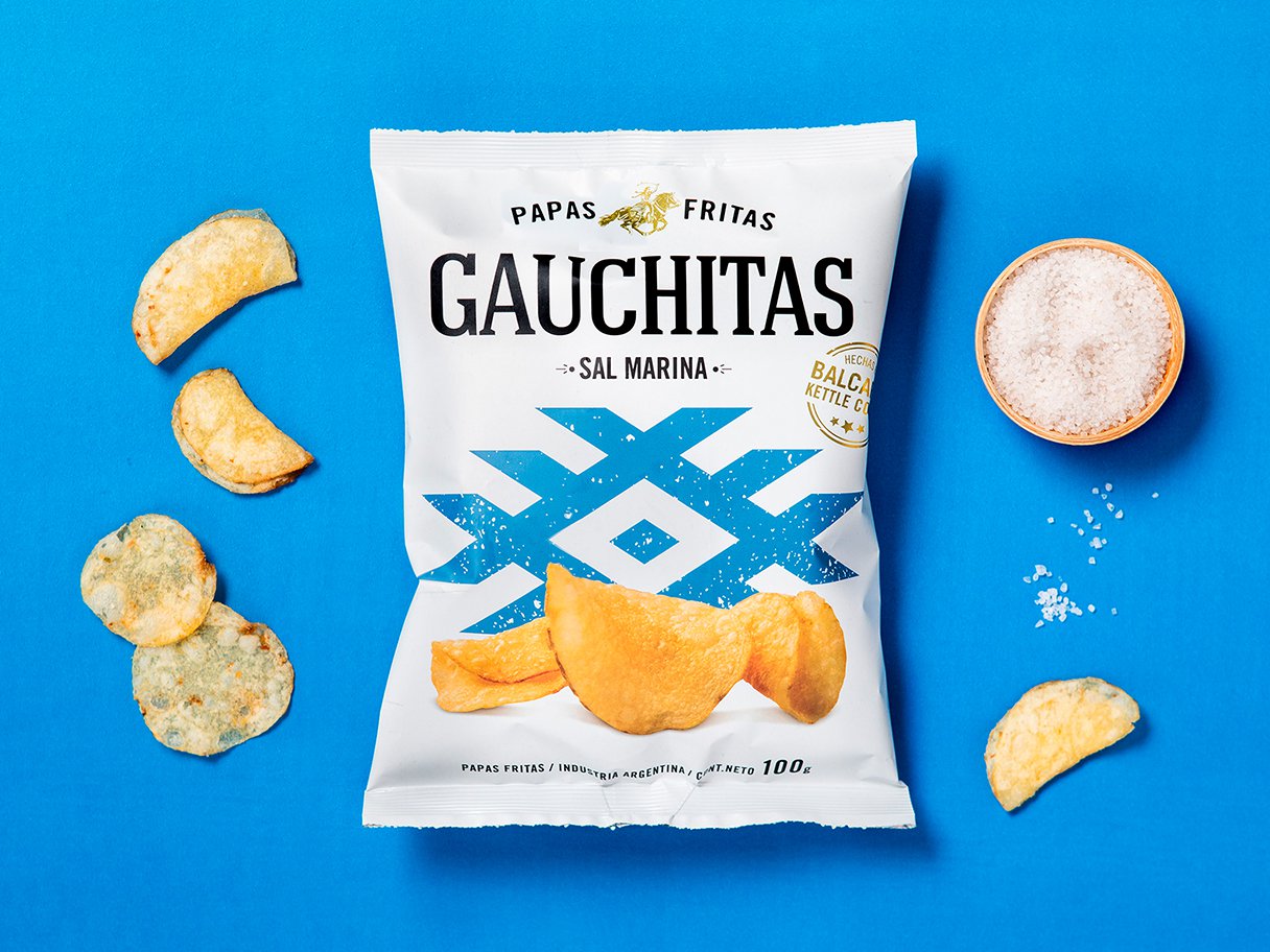 Rustic cabin in a golden field at sunset