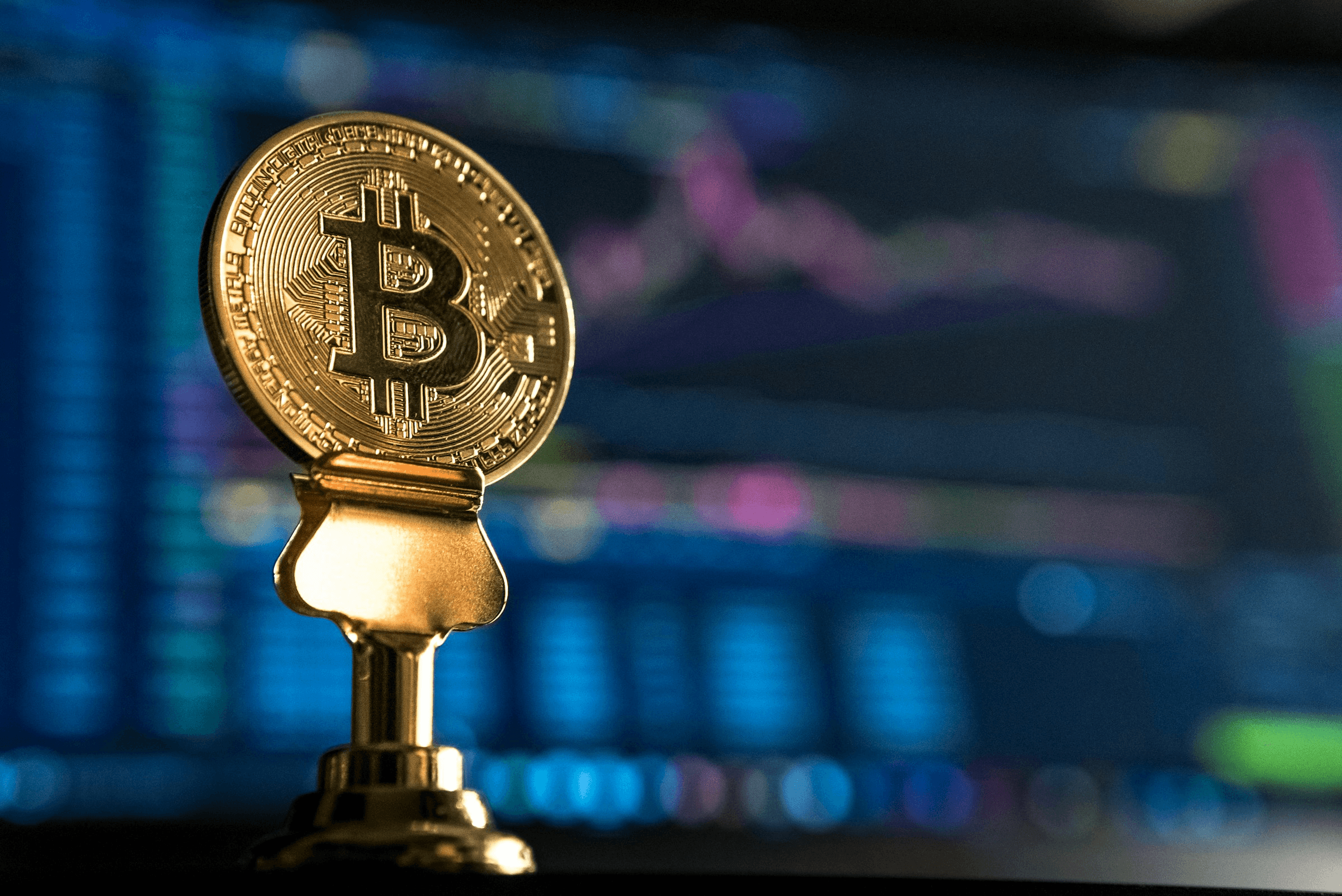 Bitcoin coin with trading chart background -  Onchain vs Offchain 