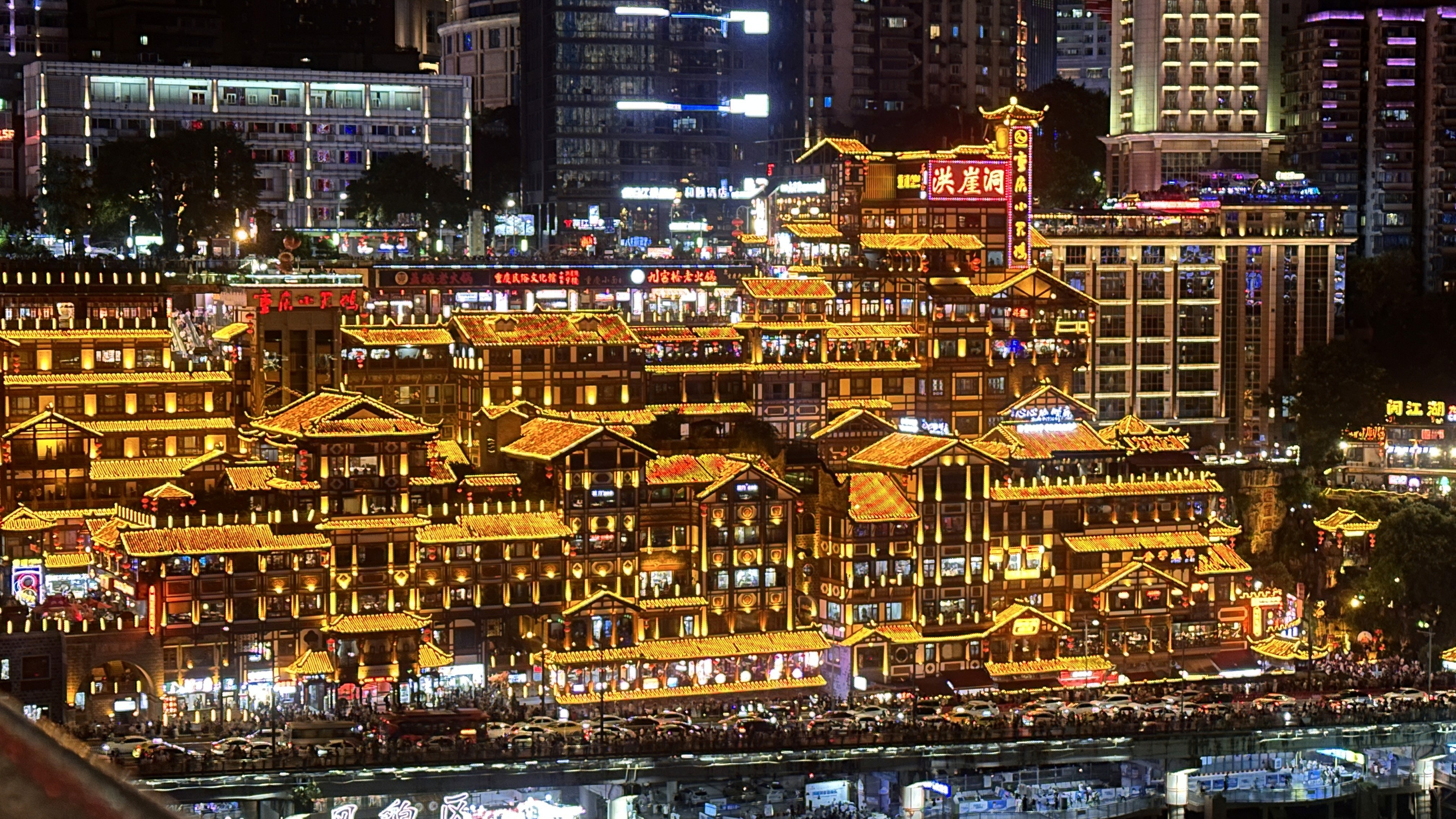a group of people walking on a sidewalk