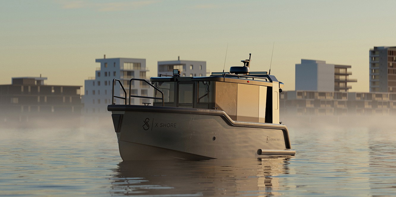 An electric professional boat X Shore Pro in the calm morning water