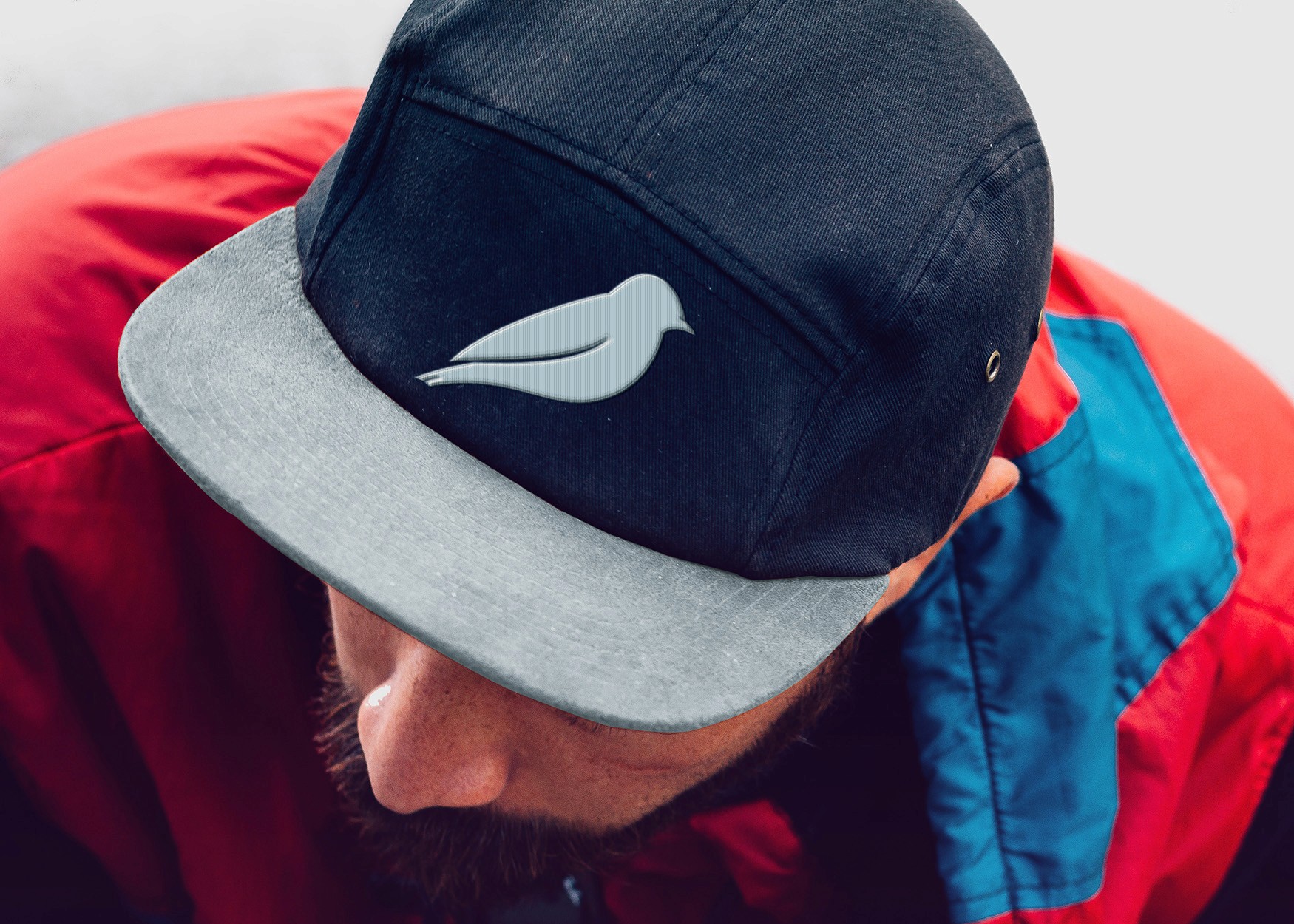 Graphic design mockup of a hat for Livera — modern, clean brandmark style logo of a bluebirdwith an sleek sans serif typography, designed by Will Lefkovich.