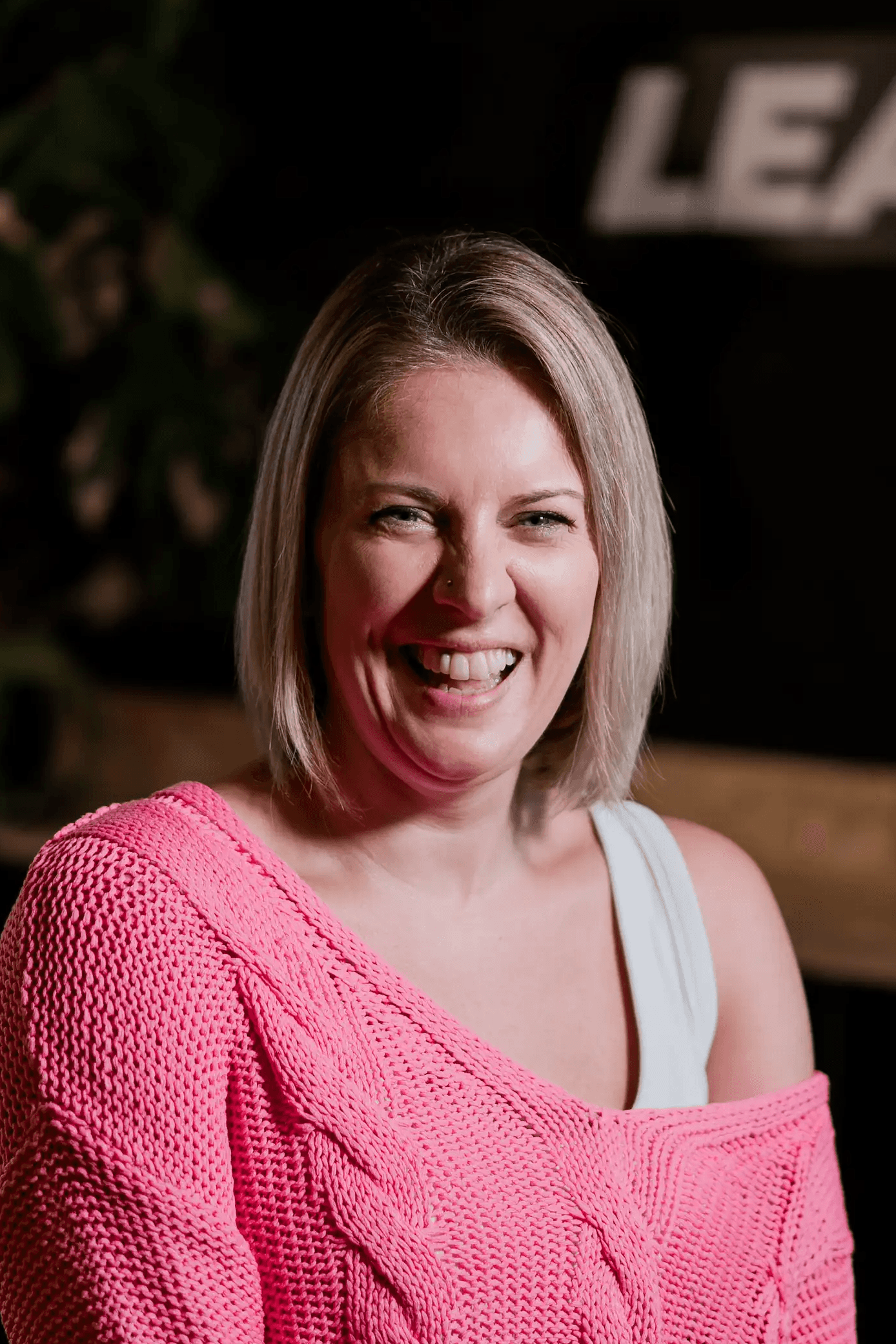 headshot of female in bright background
