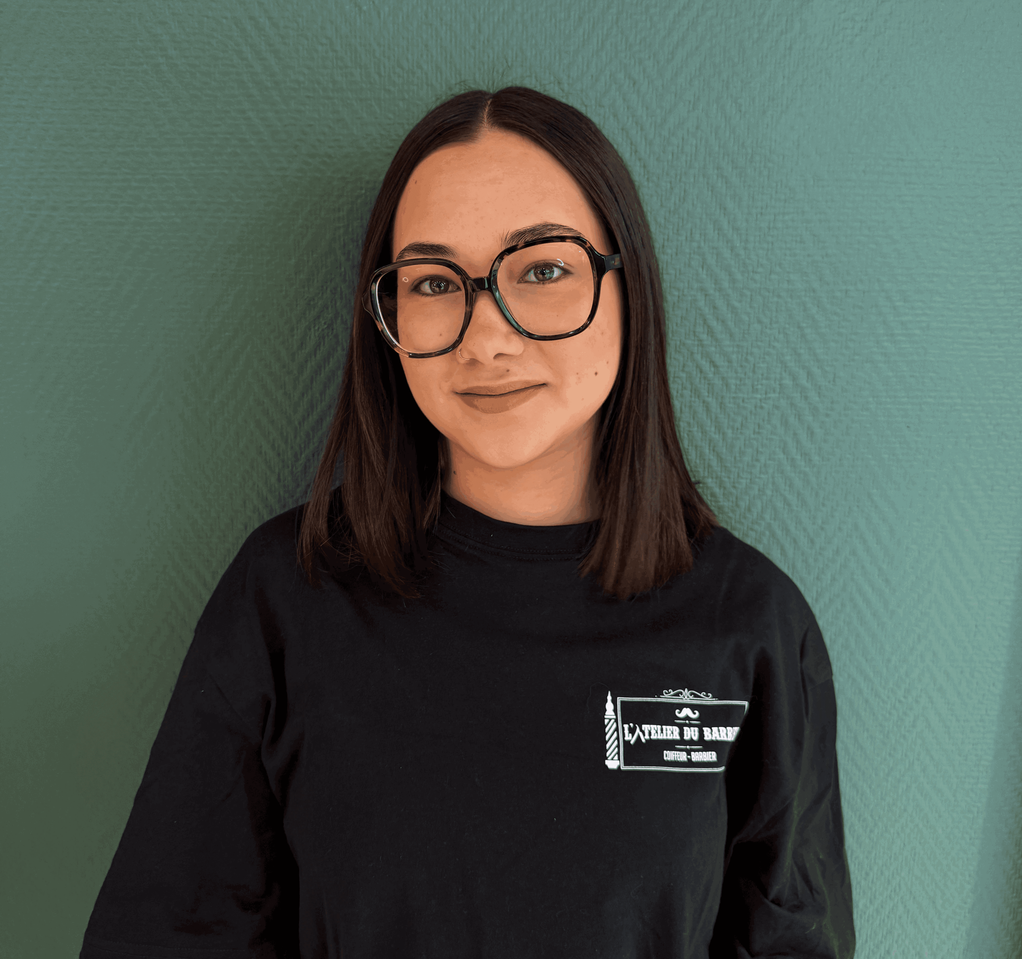 man in black hoodie wearing black framed eyeglasses