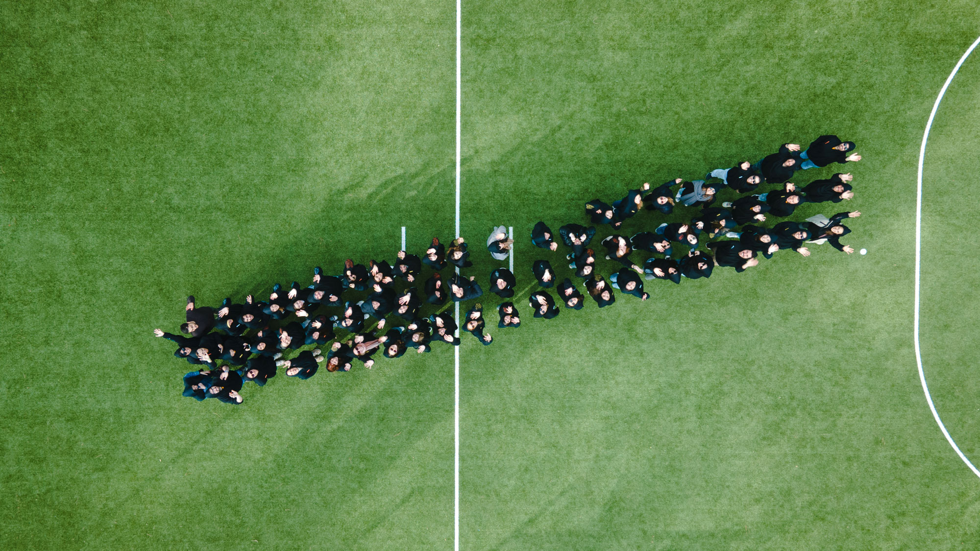 Aerial view of slanters creating a slant shape in a soccer field