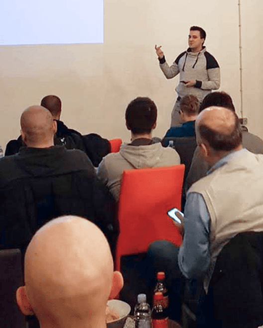 Supercharge Design team giving talks, mentoring, and connecting with the design community at conferences and workshops