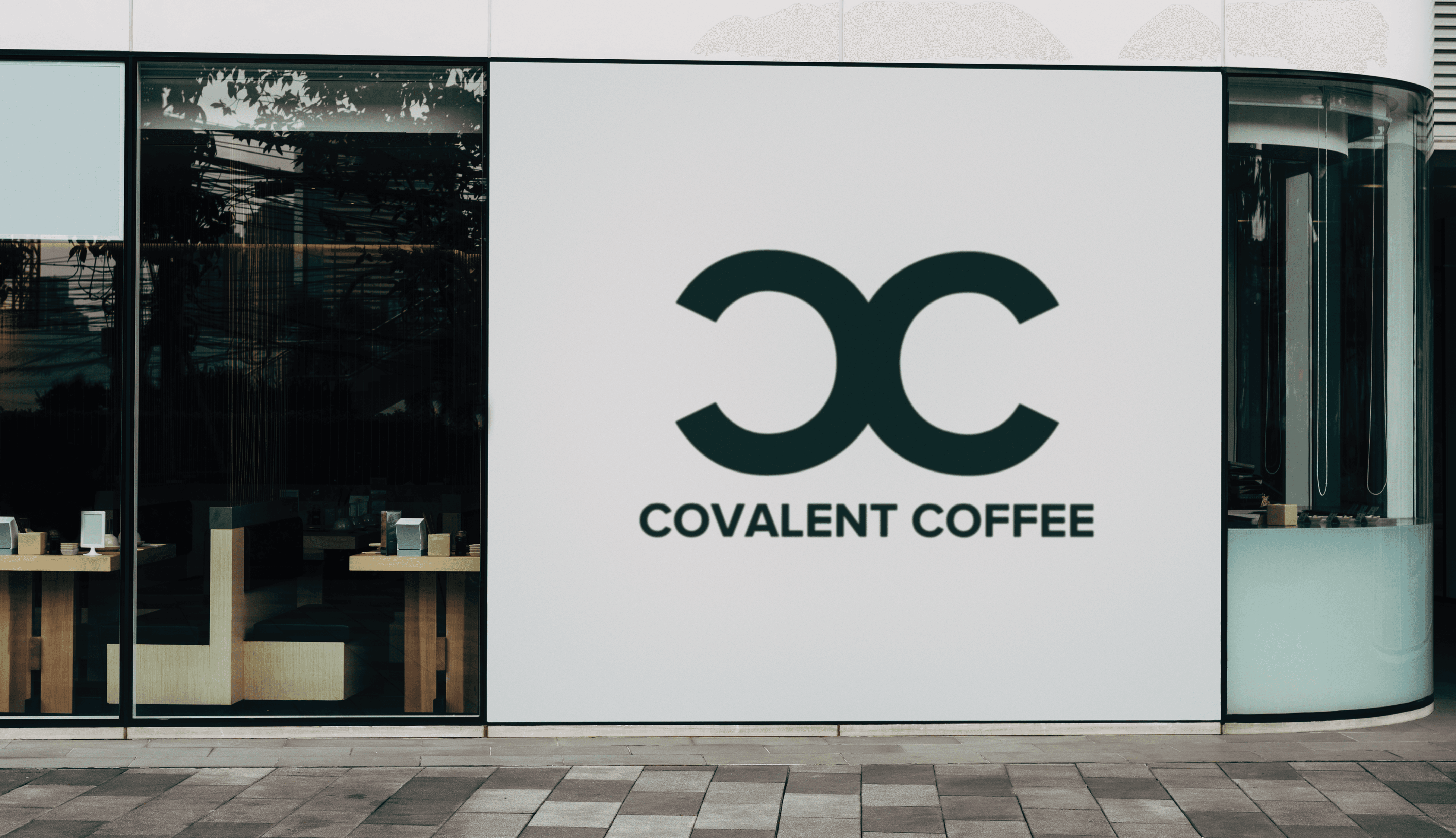 Minimalist coffee can design in hand – black and white packaging with bold typography