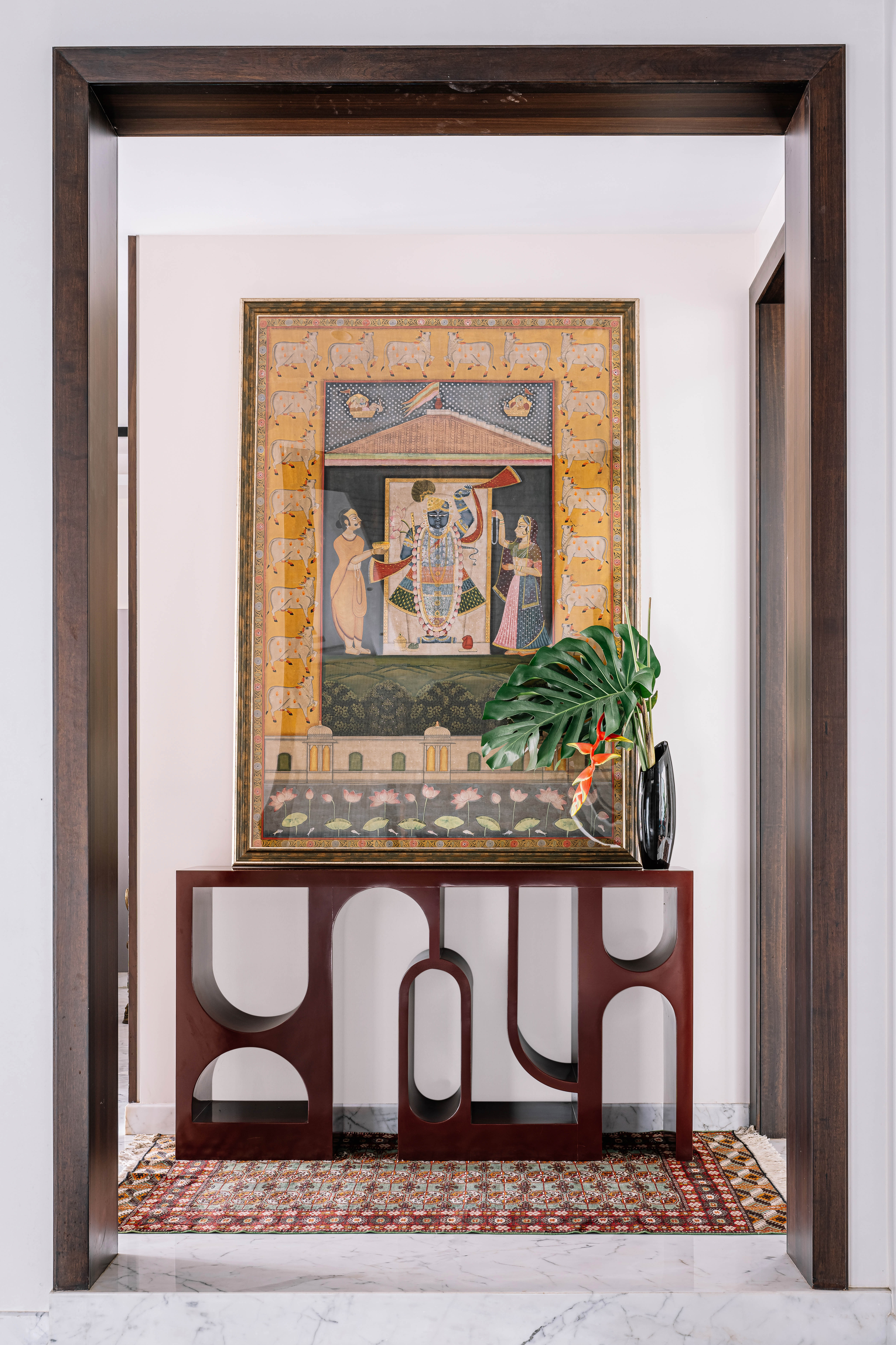 Warm modern orange living room with sofa, lamp.