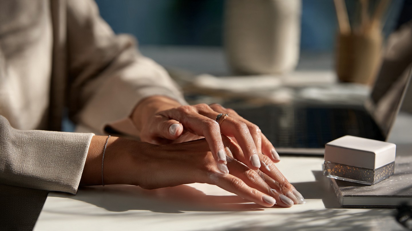 person_working_at_a_desk_with_notebook