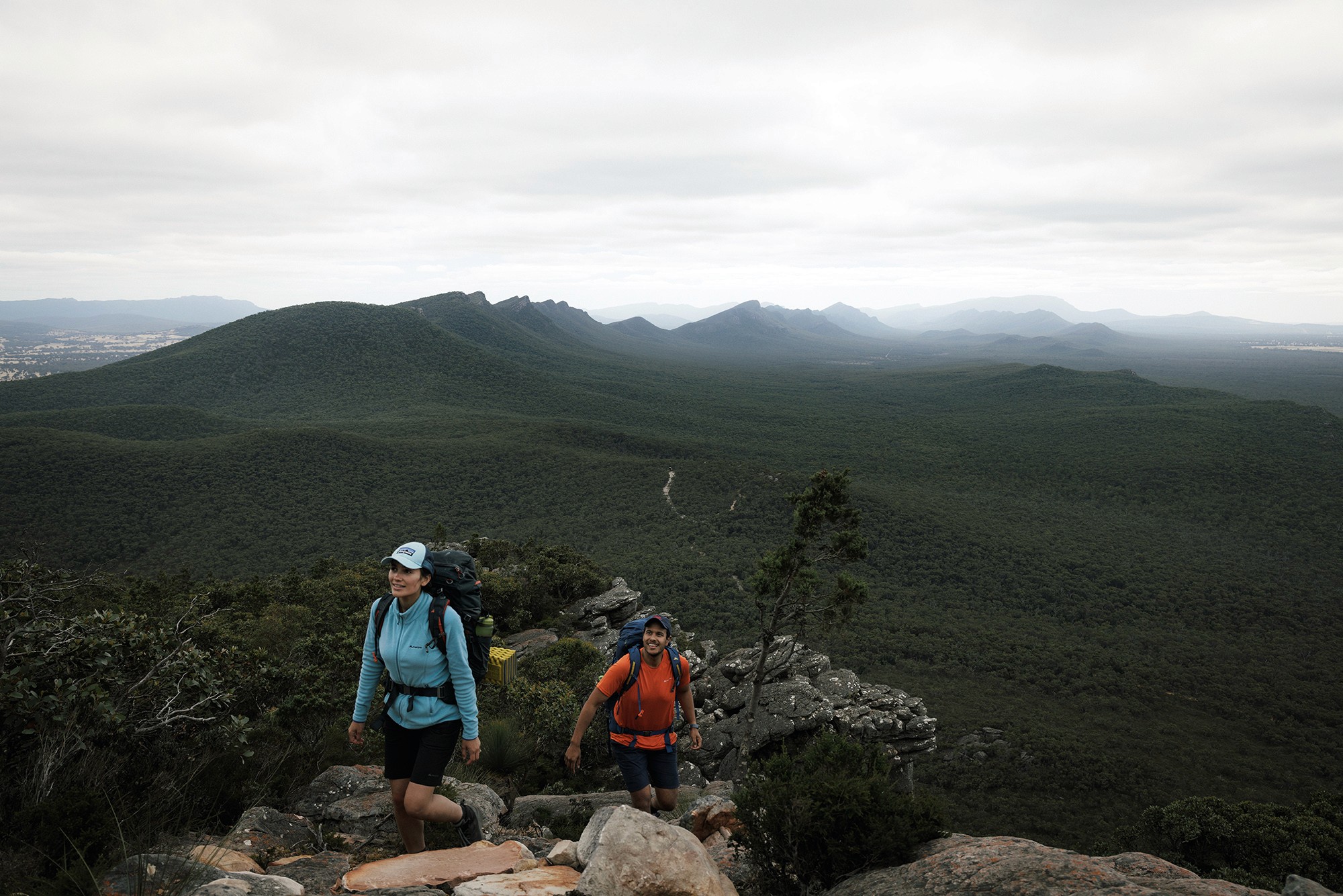 hikers climbing rocky terrain