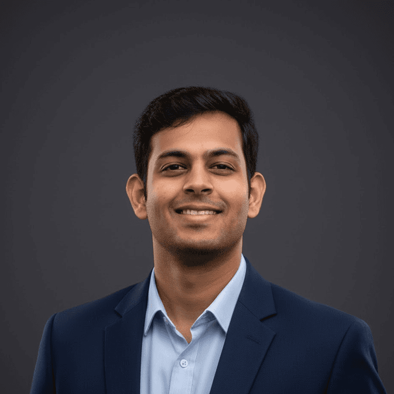 a man with a beard wearing a black jacket