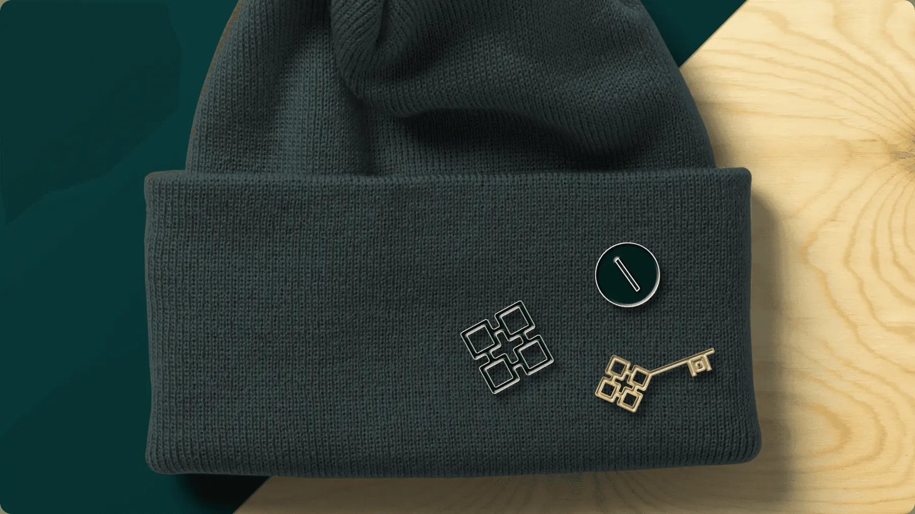 Prospero Wealth enamel pins on a beanie