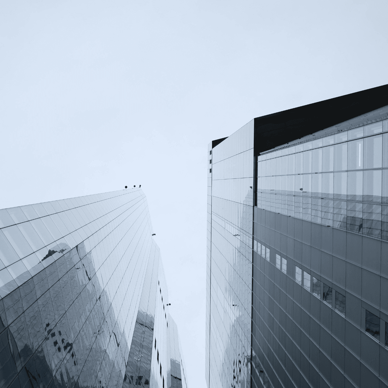 two people looking at a tablet and smiling