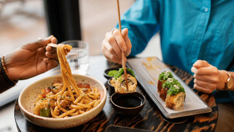 Two Malaysian customers eating