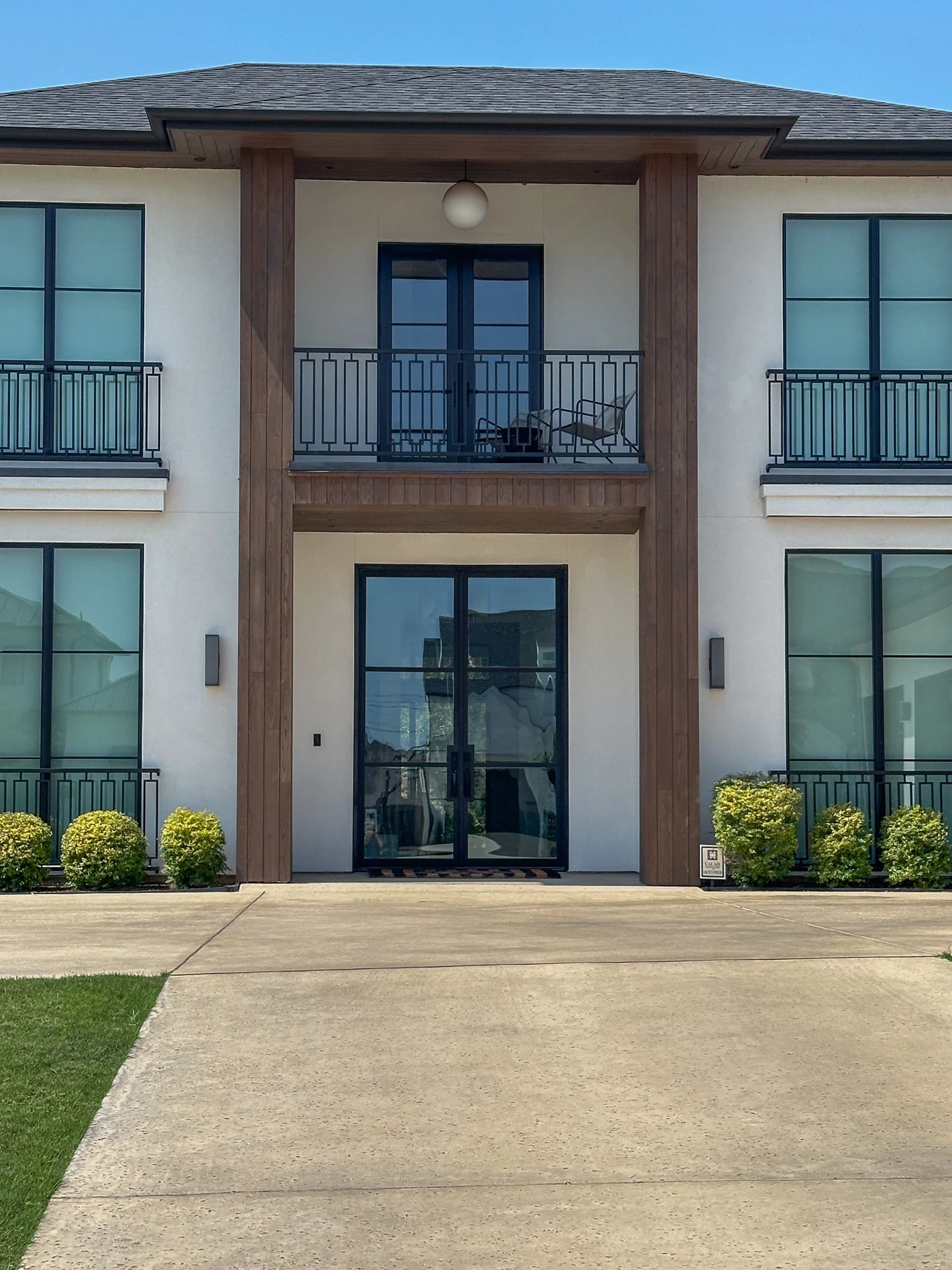 Traditional wrought iron double doors by M2 Metals Iron Doors DFW